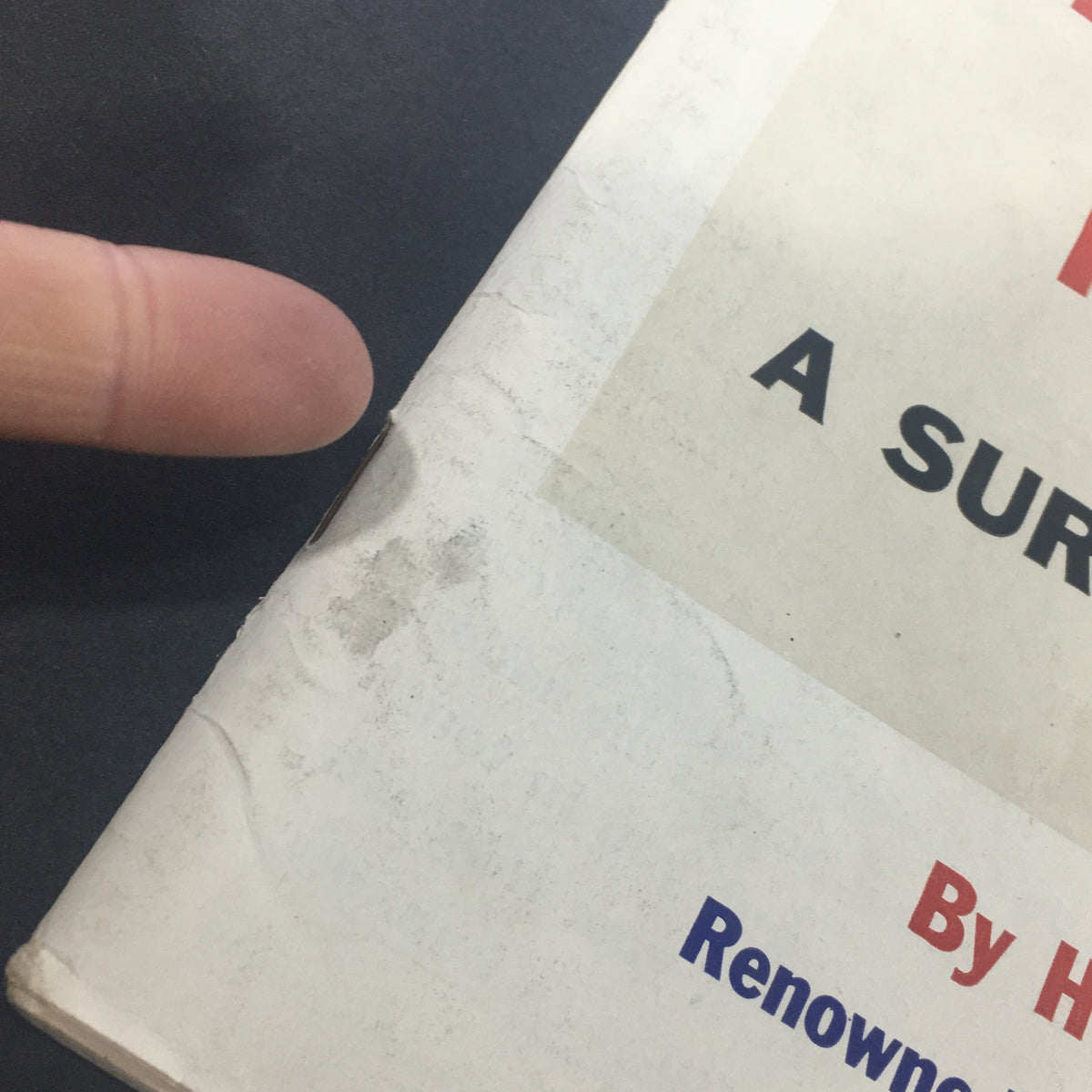 Close-up of the edge of the vintage U.S. News & World Report magazine from August 29, 1960 titled 'Neither War Nor Peace', showing signs of wear and an address label for authentic vintage appeal.