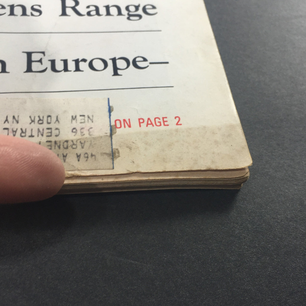 Bottom edge of the VTG U.S. News & World Report Magazine March 16 1970 showing a sticker and wear, with a focus on the publication's date.