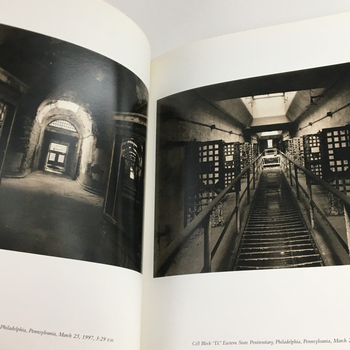 Black and white photograph depicting the interior of Eastern State Penitentiary in Philadelphia, taken on March 25, 1997, from Contact Sheet Number 110 January 2001 Margaret Stratton Light Work Portfolio.