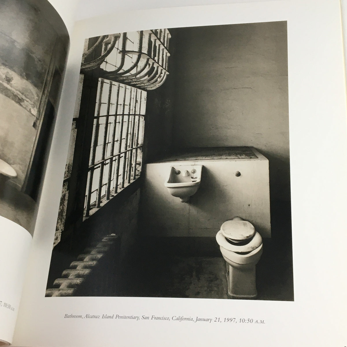 Black and white photograph of a restroom at Alcatraz Island Penitentiary, San Francisco, taken on January 21, 1997, featured in Contact Sheet Number 110 January 2001 Margaret Stratton Light Work Portfolio.