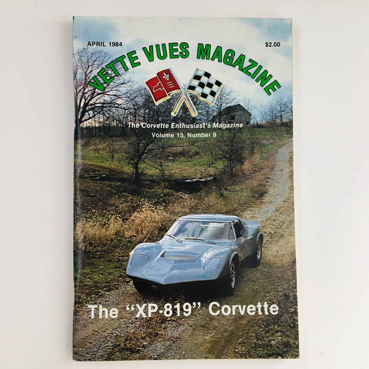 Vette Vues Magazine April 1984 Vol 13 #9 featuring the 'XP-819' Corvette on the cover, showcasing the car in a natural setting with a dirt path and trees, highlighting its unique design and historical significance.