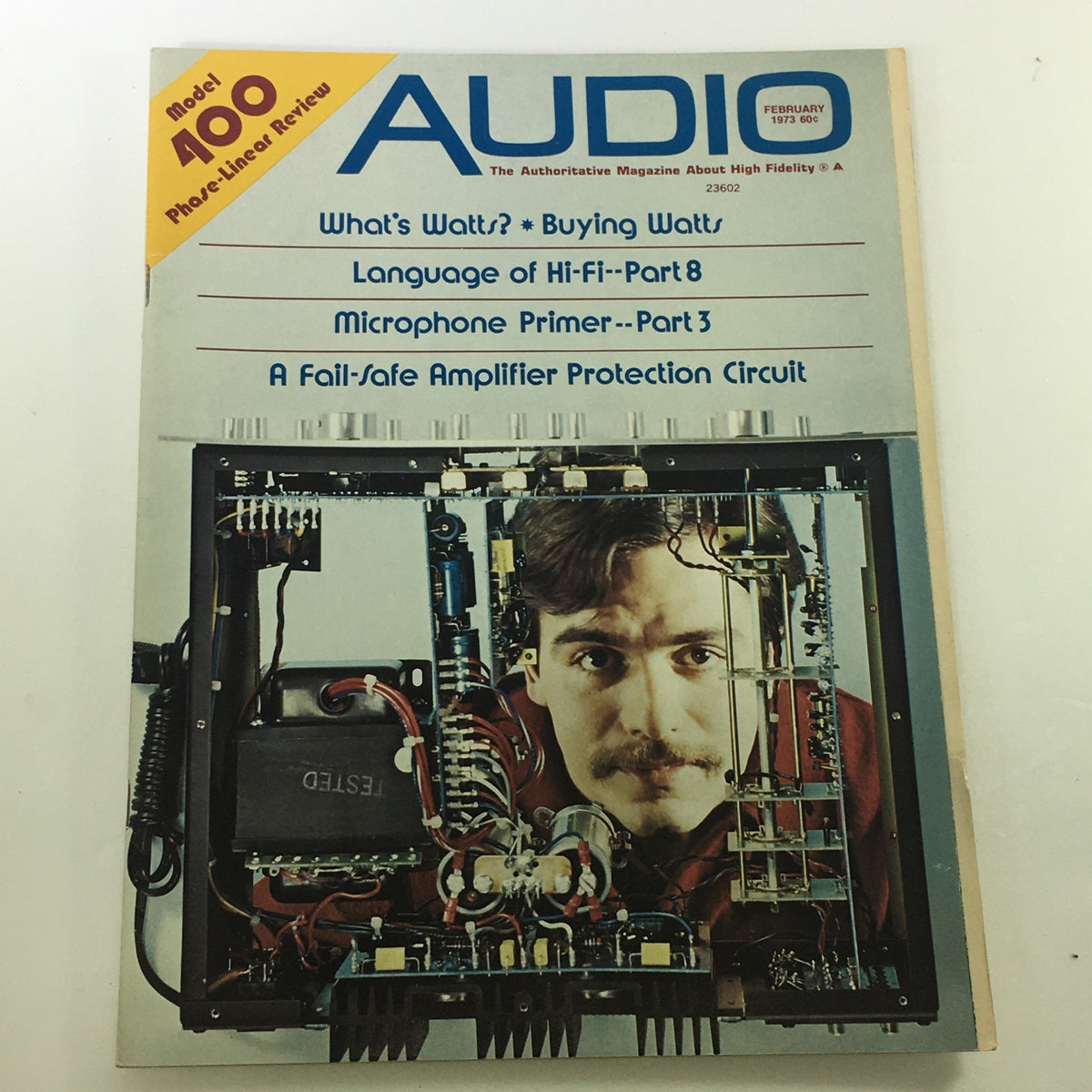 VTG Audio and Music Magazine February 1973 cover featuring 'A Fail-Safe Amplifier Protection' article, showcasing vintage audio technology with a graphic design characteristic of the 1970s.