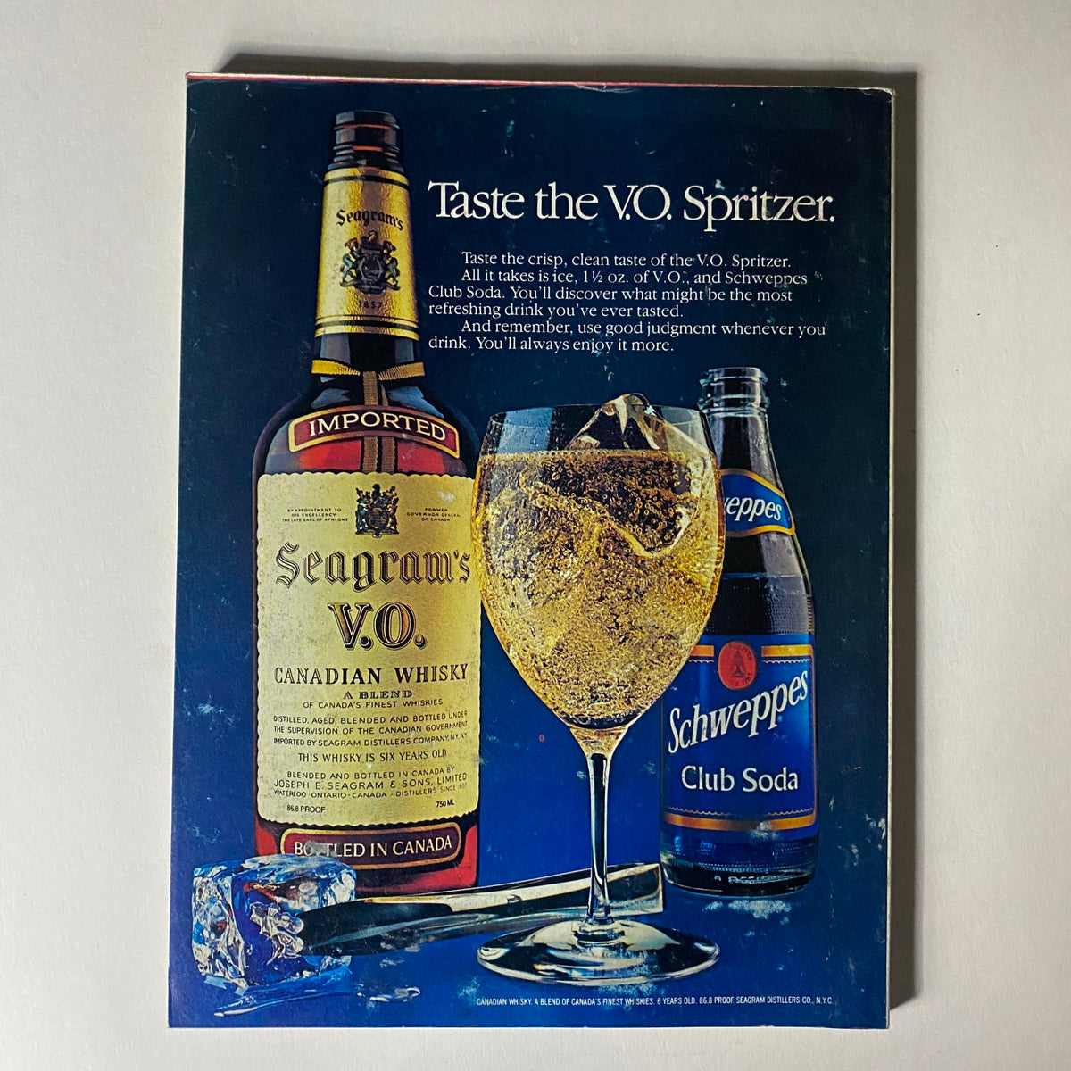 Vintage advertisement for Seagram's V.O. Canadian whisky and Schweppes Club Soda, included in VTG Vogue Magazine July 1982.