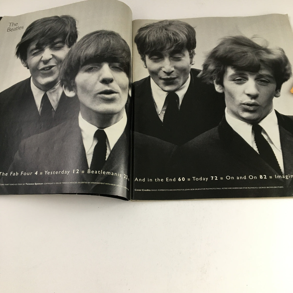 Inside spread of Life Magazine December 1995 showcasing The Beatles, highlighting their humorous expressions and classic hairstyles, titled 'Life Magazine December 1995: The Beatles From Yesterday to Today'.