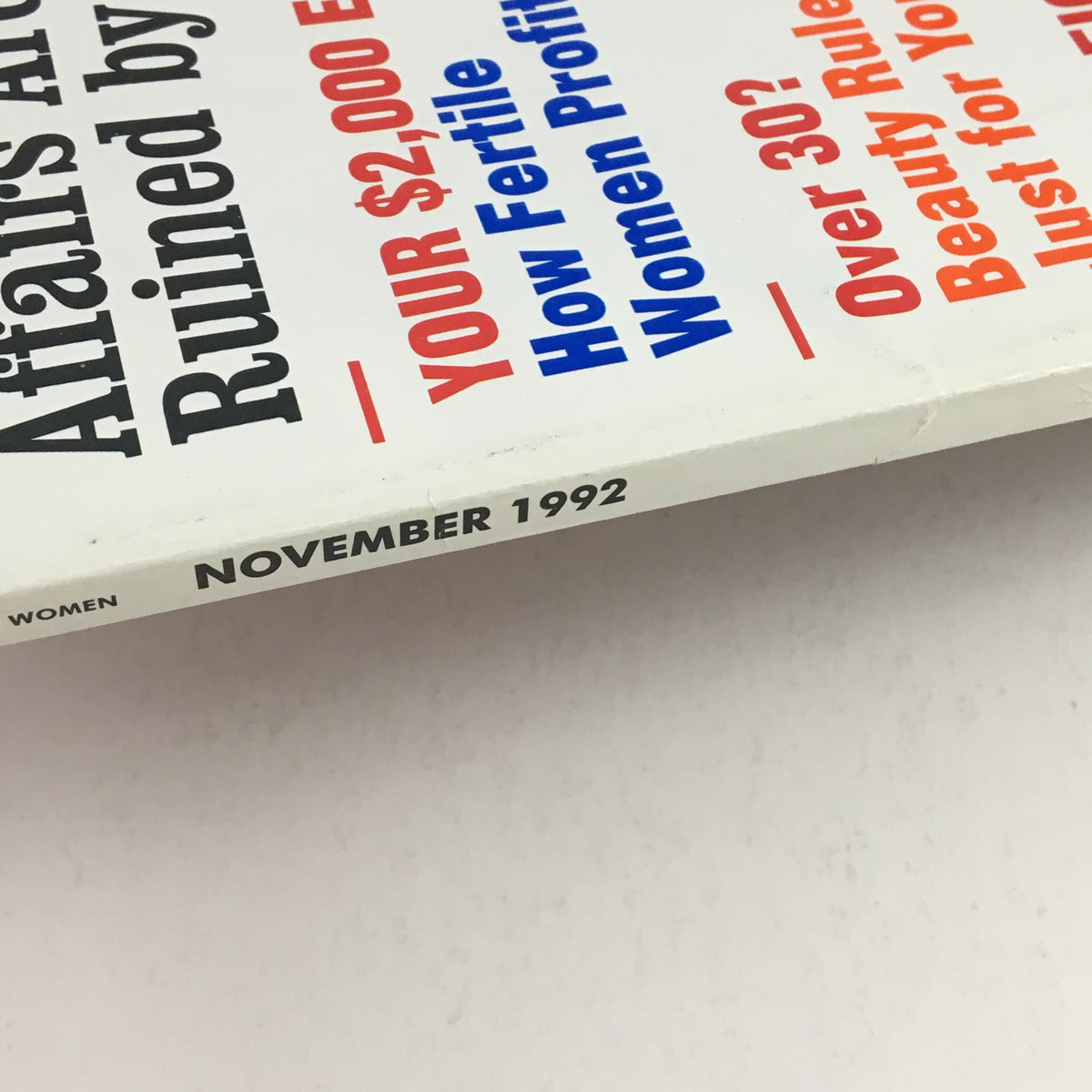 Close-up of the spine of Red Book Magazine from November 1992, showcasing the issue date and title content related to women's interests and affairs.