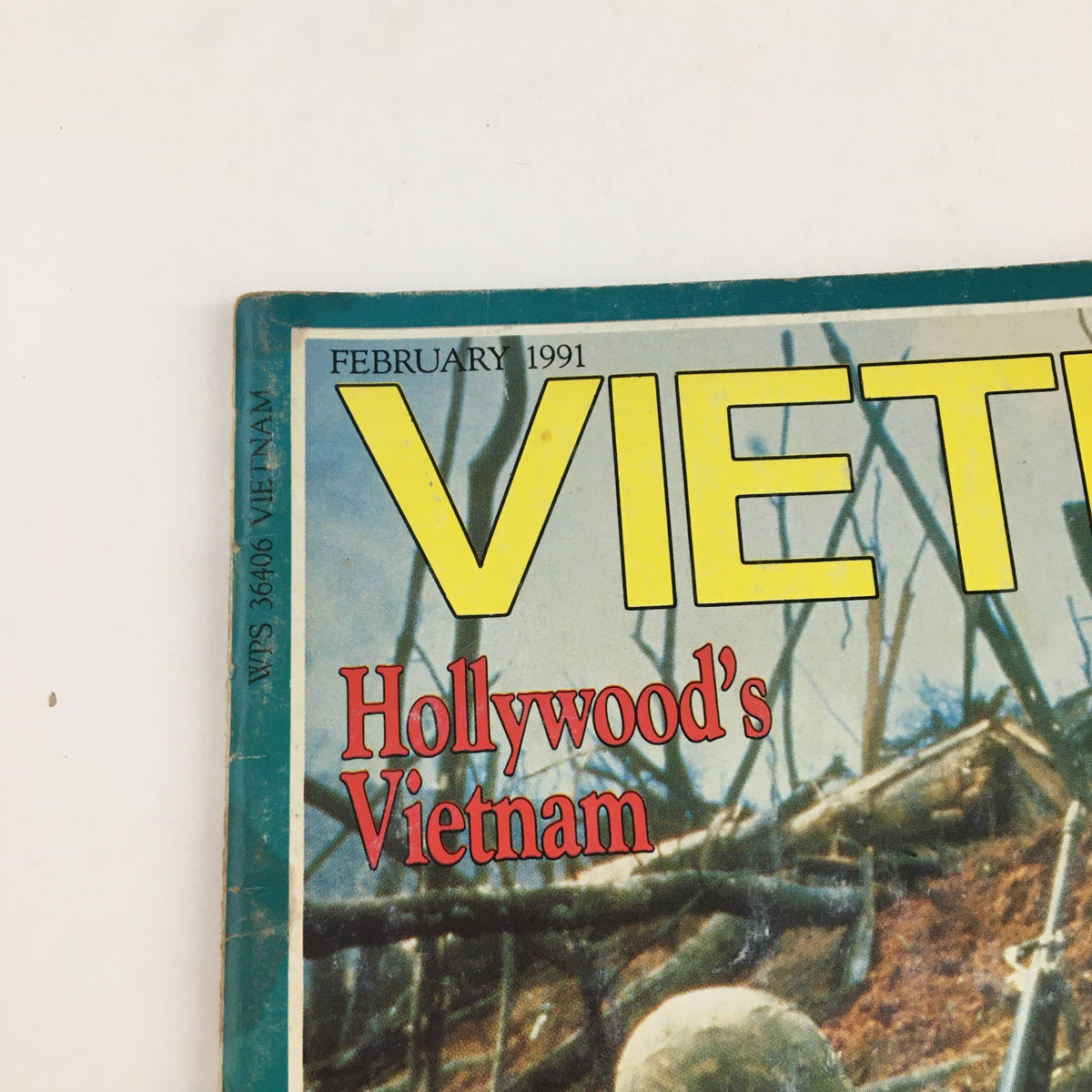Close-up of the title section of Vietnam Magazine February 1991, highlighting 'Hollywood's Vietnam' with bold text on a vintage magazine cover.