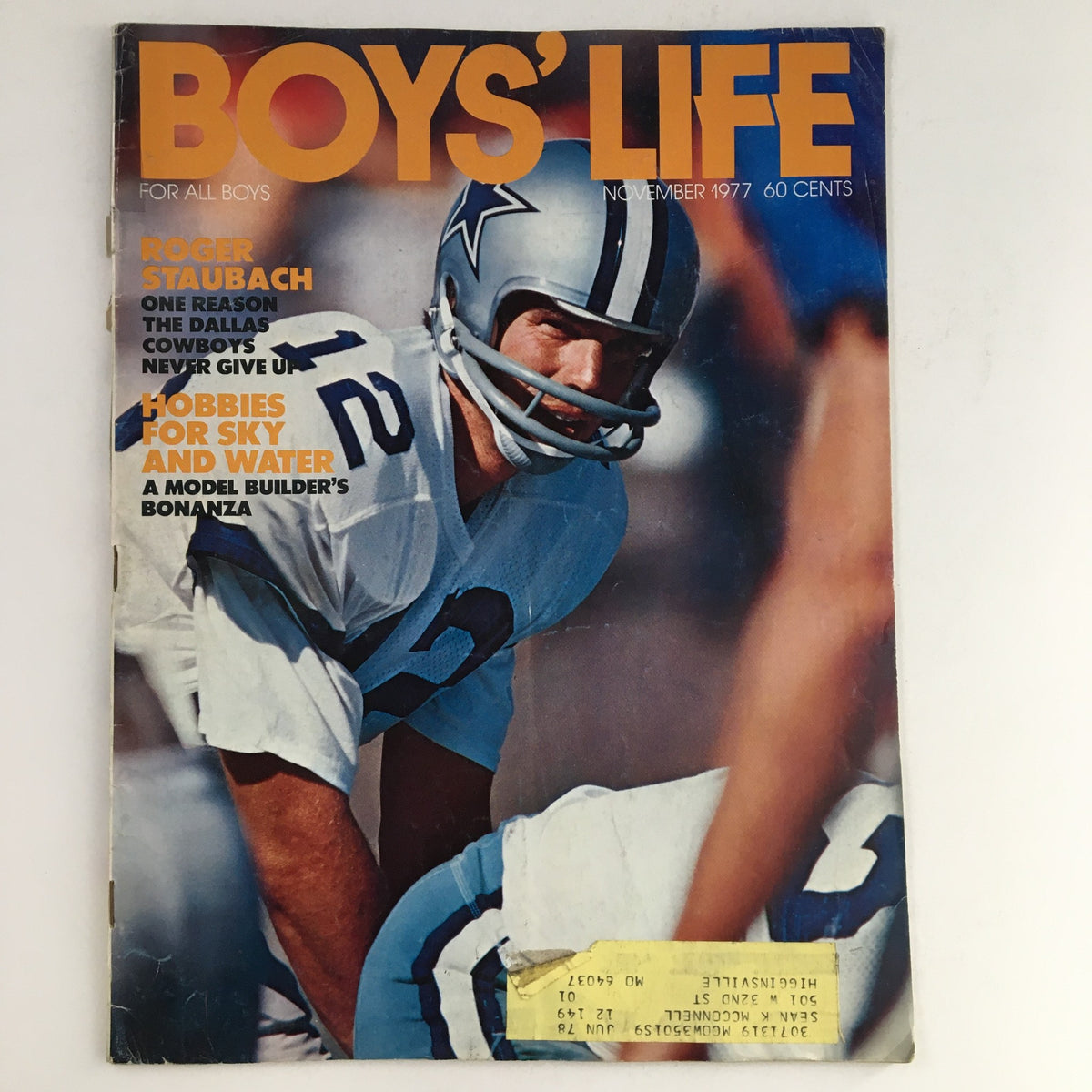 Boys' Life Magazine November 1977 cover featuring Roger Staubach, Dallas Cowboys quarterback, highlighting the theme 'Never Give Up'.