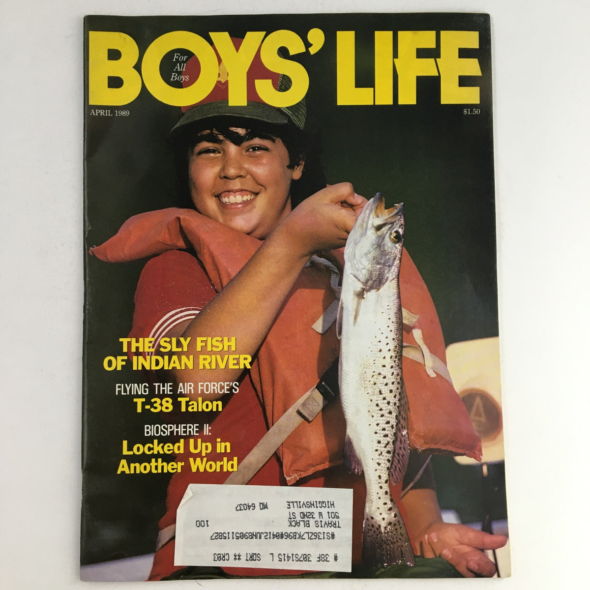 Boys' Life Magazine April 1989 cover featuring a smiling boy in a life jacket holding a fish, showcasing the article 'The Sly Fish of Indian River' and 'Flying the Air Force's T-38 Talon'. A glimpse into adventure and nature for young readers.