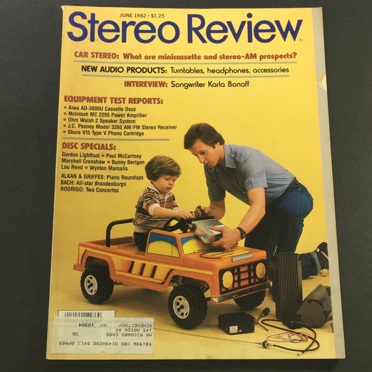 Vintage Stereo Review magazine from June 1982 featuring Paul McCartney and Wynton Marsalis on the cover, showcasing a child playing with a toy truck alongside audio equipment.