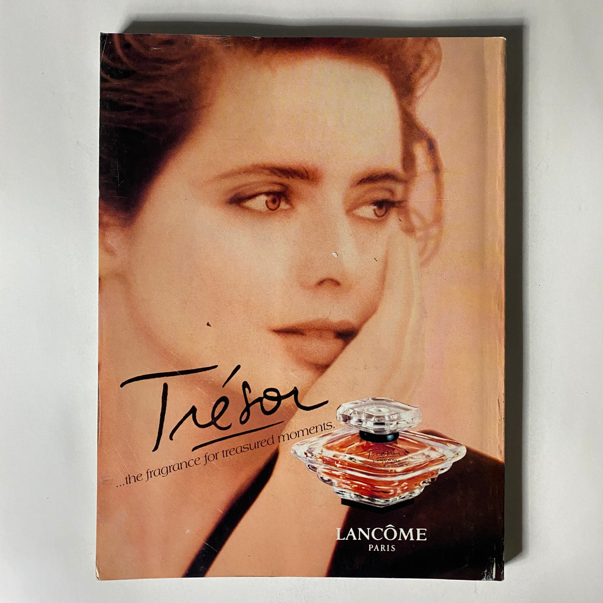 Vogue Magazine November 1991, Lancome Tresor perfume advertisement highlighting the beauty and sophistication of 90s advertising.