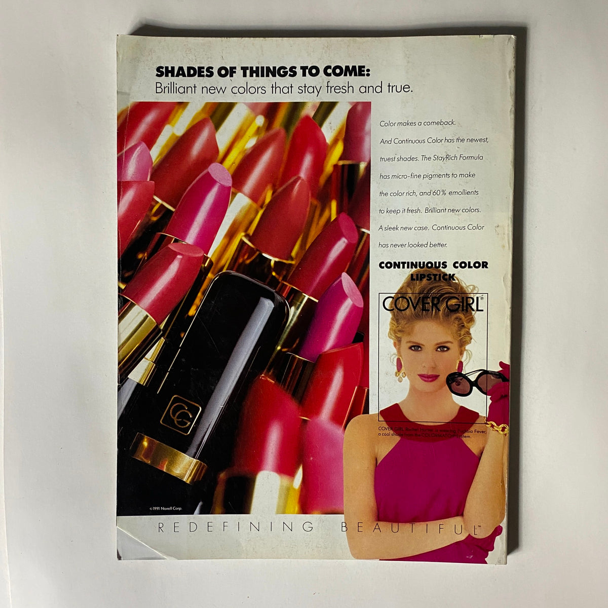 Vogue Magazine July 1991 featuring Karen Mulder by Marc Hispard with a colorful lipstick advertisement showcasing shades of CoverGirl's Continuous Color lipstick.