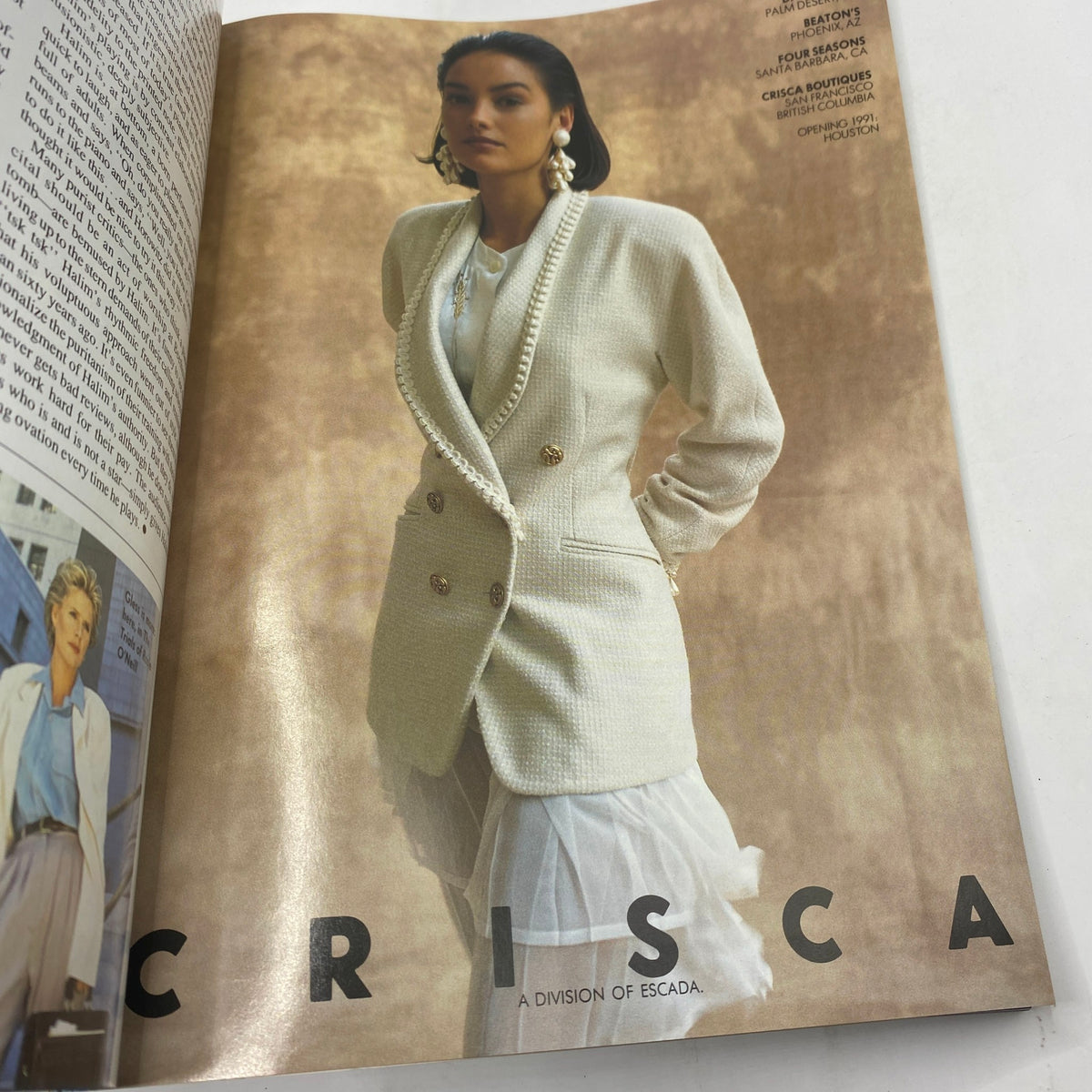 Fashion editorial page from Vogue Magazine January 1991 showcasing a model in a stylish outfit by Crisca, a division of Escada.
