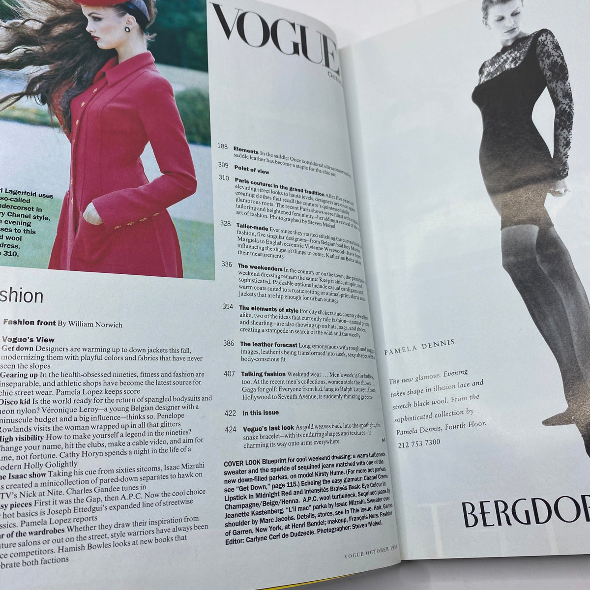 Inside page of Vogue Magazine October 1994 showcasing fashion trends with a model in a red coat and designer highlights, emphasizing 90s haute couture.