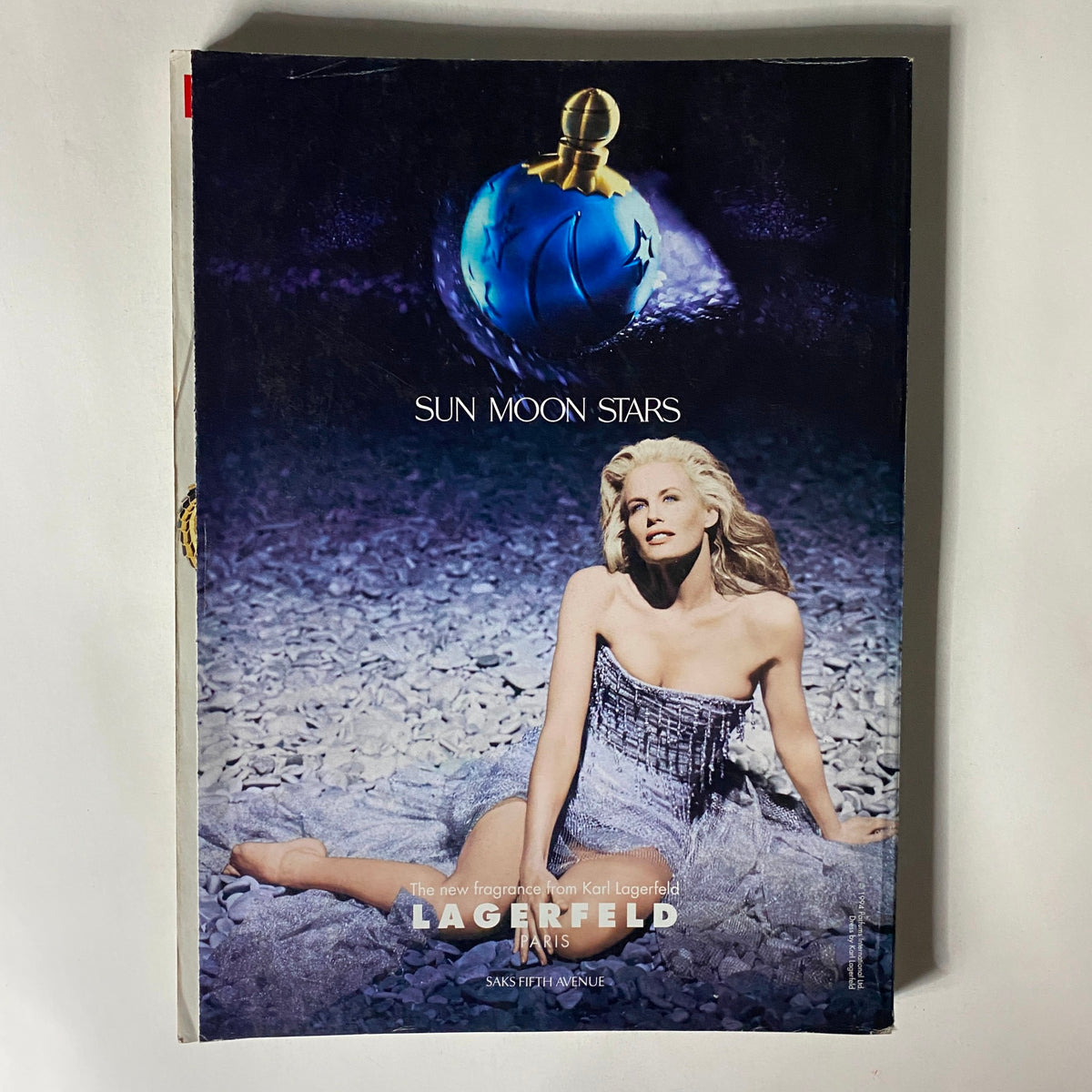 Ad page from Vogue Magazine October 1994 promoting the Lagerfeld fragrance with a glamorous model in a stunning outfit, evoking the essence of high fashion. Vogue Magazine October 1994 Kirsty Hume by Steven Meisel No Label.