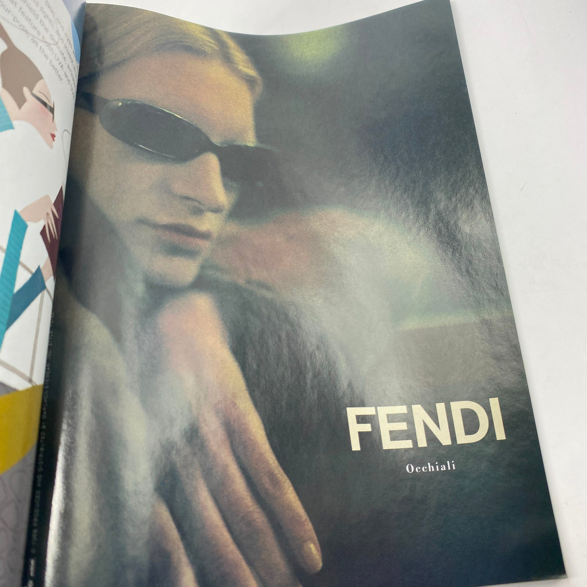 Vogue Magazine January 1999, featuring an editorial photo of a model wearing sunglasses, showcasing a Fendi advertisement.