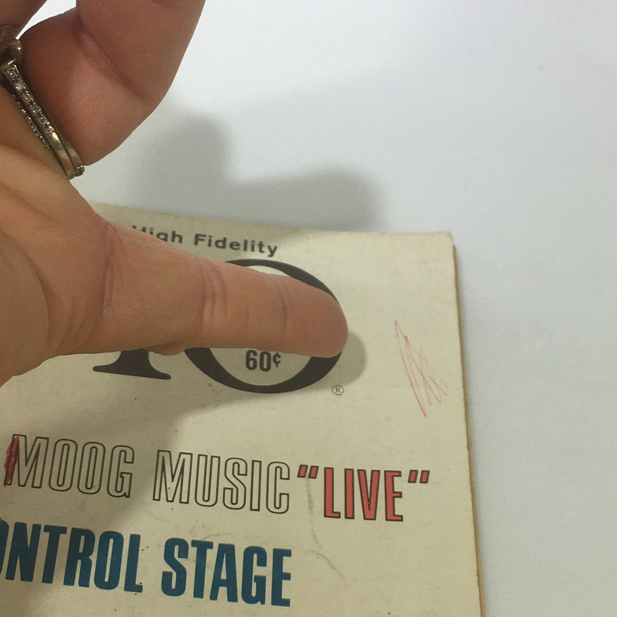 Close-up of the price and magazine details on the cover of VTG Audio & Music Magazine November 1969, highlighting the 60 cent price and featuring text about Moog Music and tone-control stage construction.