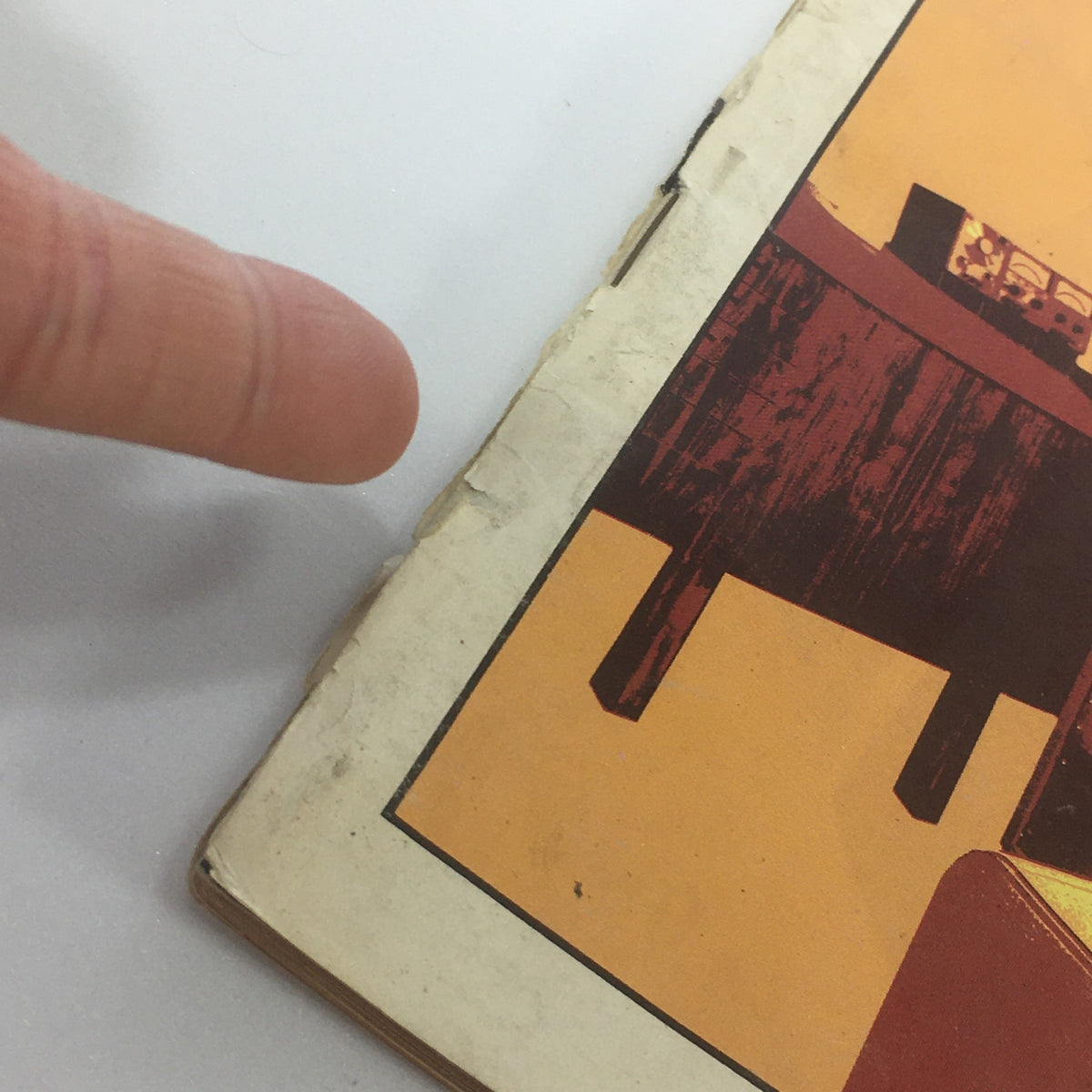 Detailed view of the corner of VTG Audio & Music Magazine November 1969, showing signs of age with wear and tear, contributing to the magazine's vintage charm and collectible value.