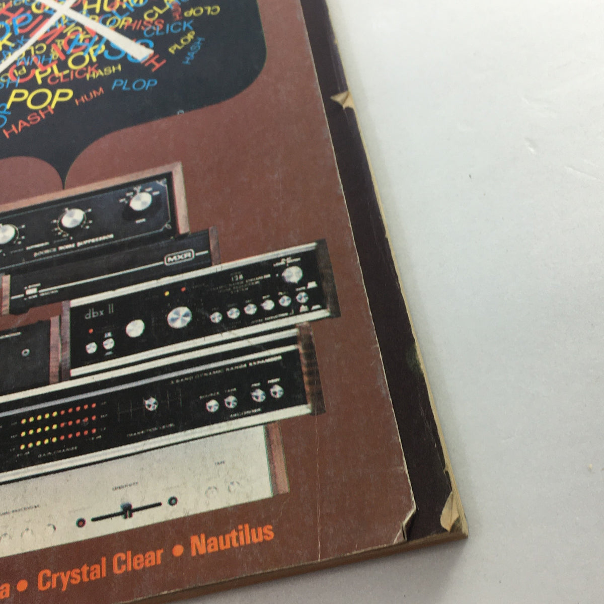 Close-up of vintage audio equipment featured on the cover of VTG High Fidelity Music Magazine July 1977, showcasing the direct-to-disc recording technology popular in the 1970s.
