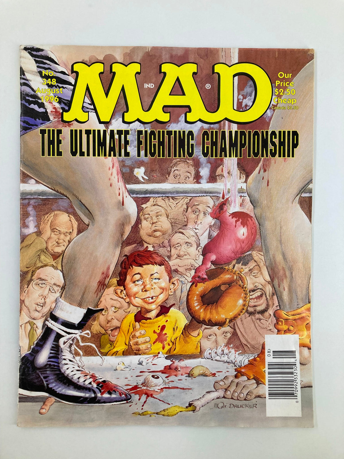 Mad Magazine August 1996 No. 348 cover featuring 'The Ultimate Fighting Championship,' illustrated by Mort Drucker, showcasing a humorous take on martial arts with a colorful, satirical scene.