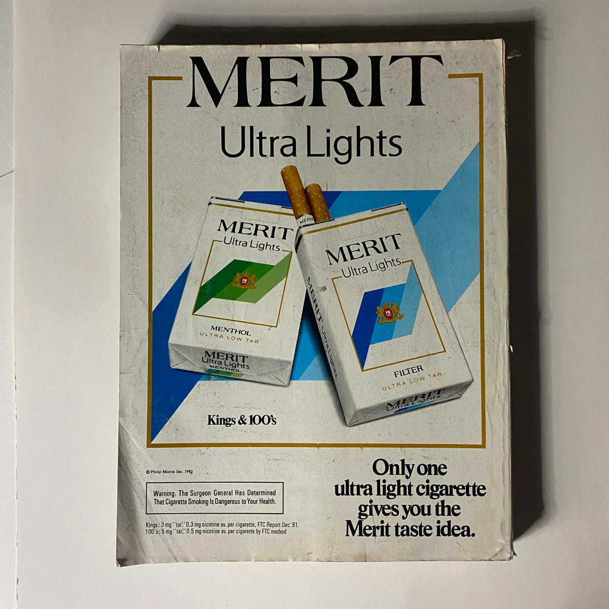 VTG Vogue Magazine October 1982 featuring a classic cigarette advertisement for Merit Ultra Lights, illustrating the vintage advertising style of the era.