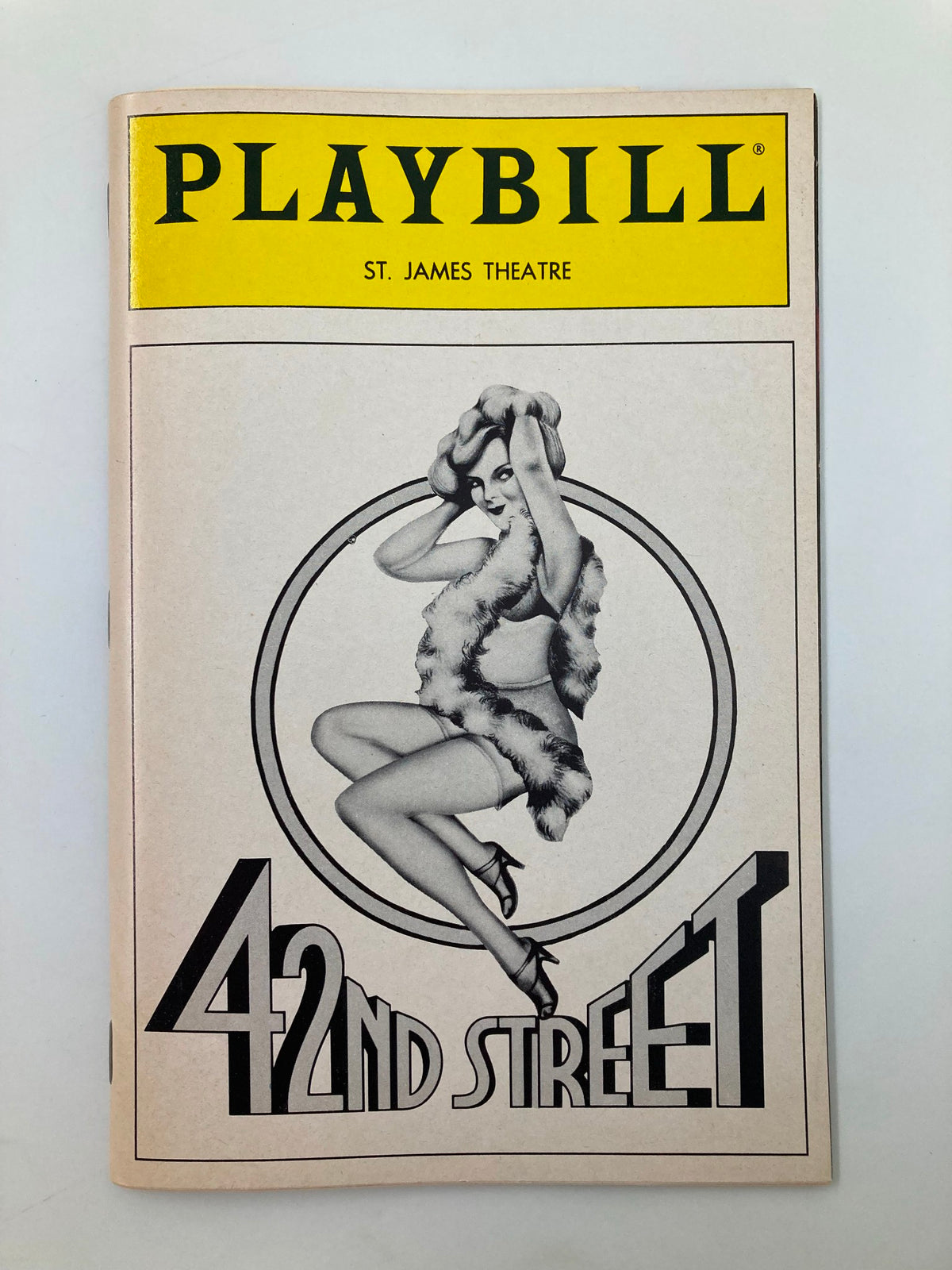 1987 Playbill for the iconic St. James Theatre production of 42nd Street featuring a vintage cover design with a theatrical dancer.