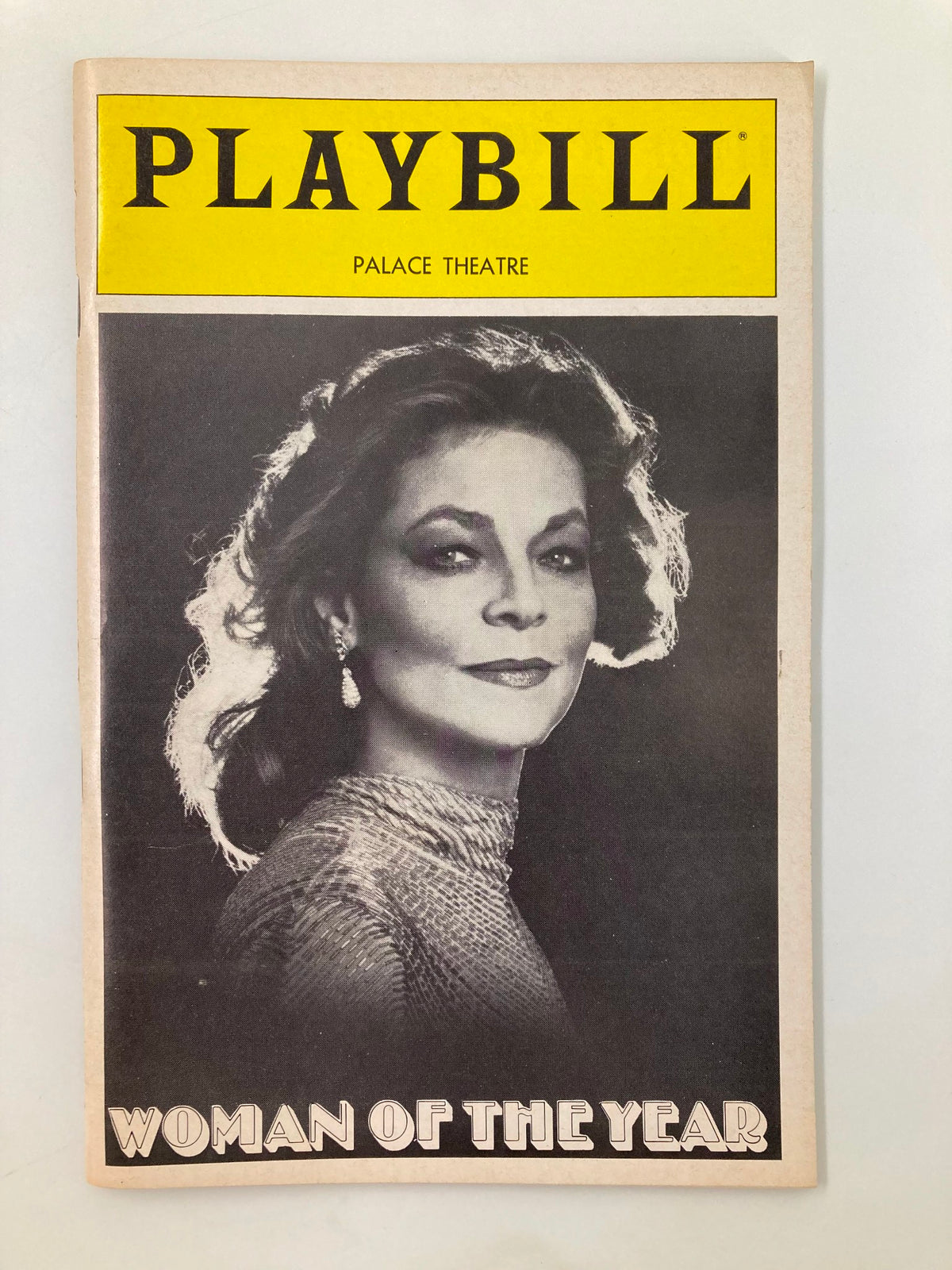 1982 Playbill from The Palace Theatre featuring Lauren Bacall in 'Woman of the Year', showcasing a striking black and white portrait cover design.