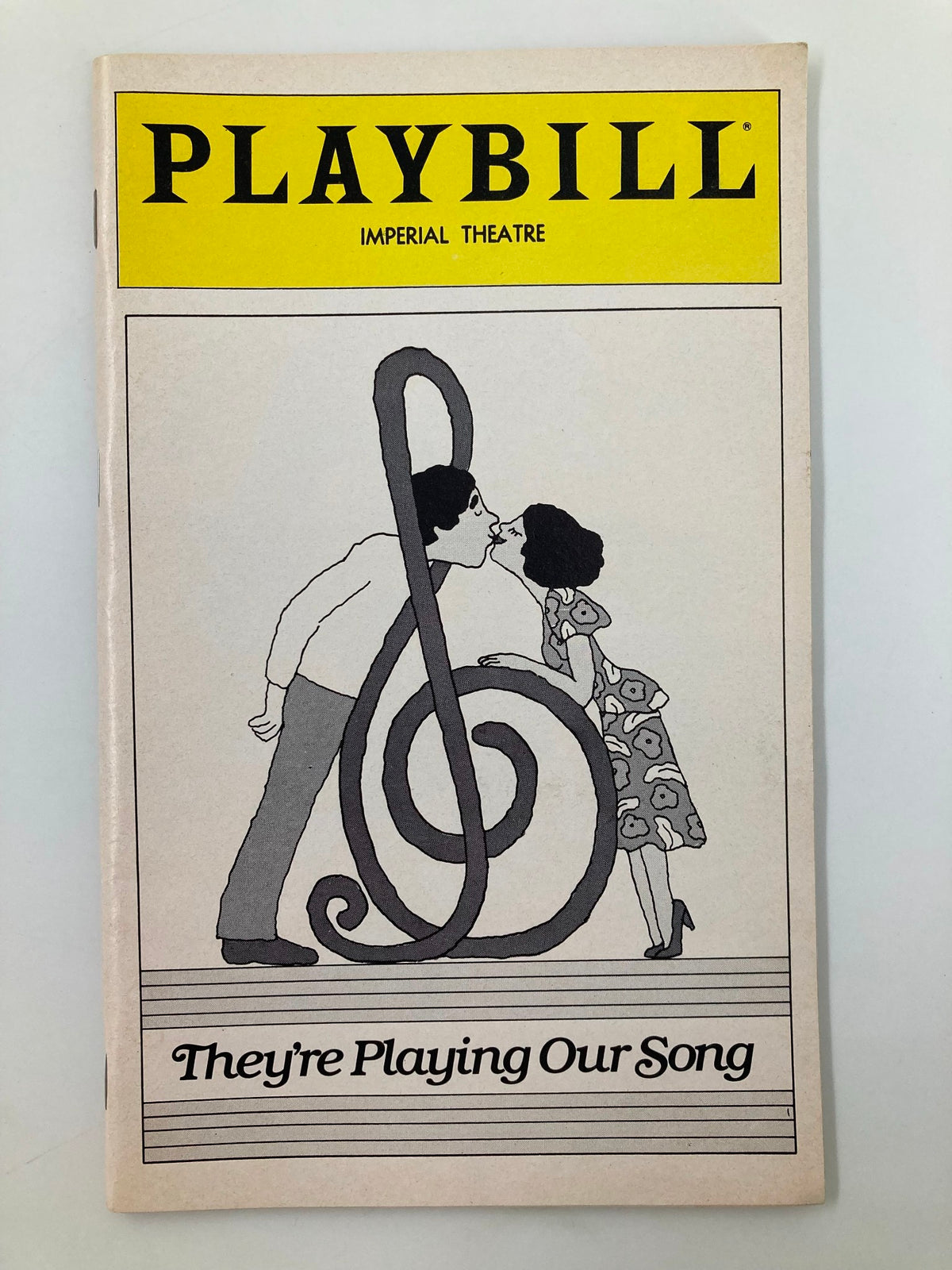 1981 Playbill from the Imperial Theatre featuring 'They're Playing Our Song', showcasing a whimsical illustration of a couple in a musical setting.