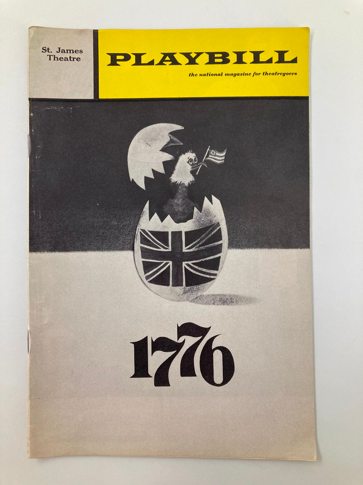 1970 Playbill St. James Theatre 1776 cover featuring a creative illustration of an egg hatching with a British flag inside.