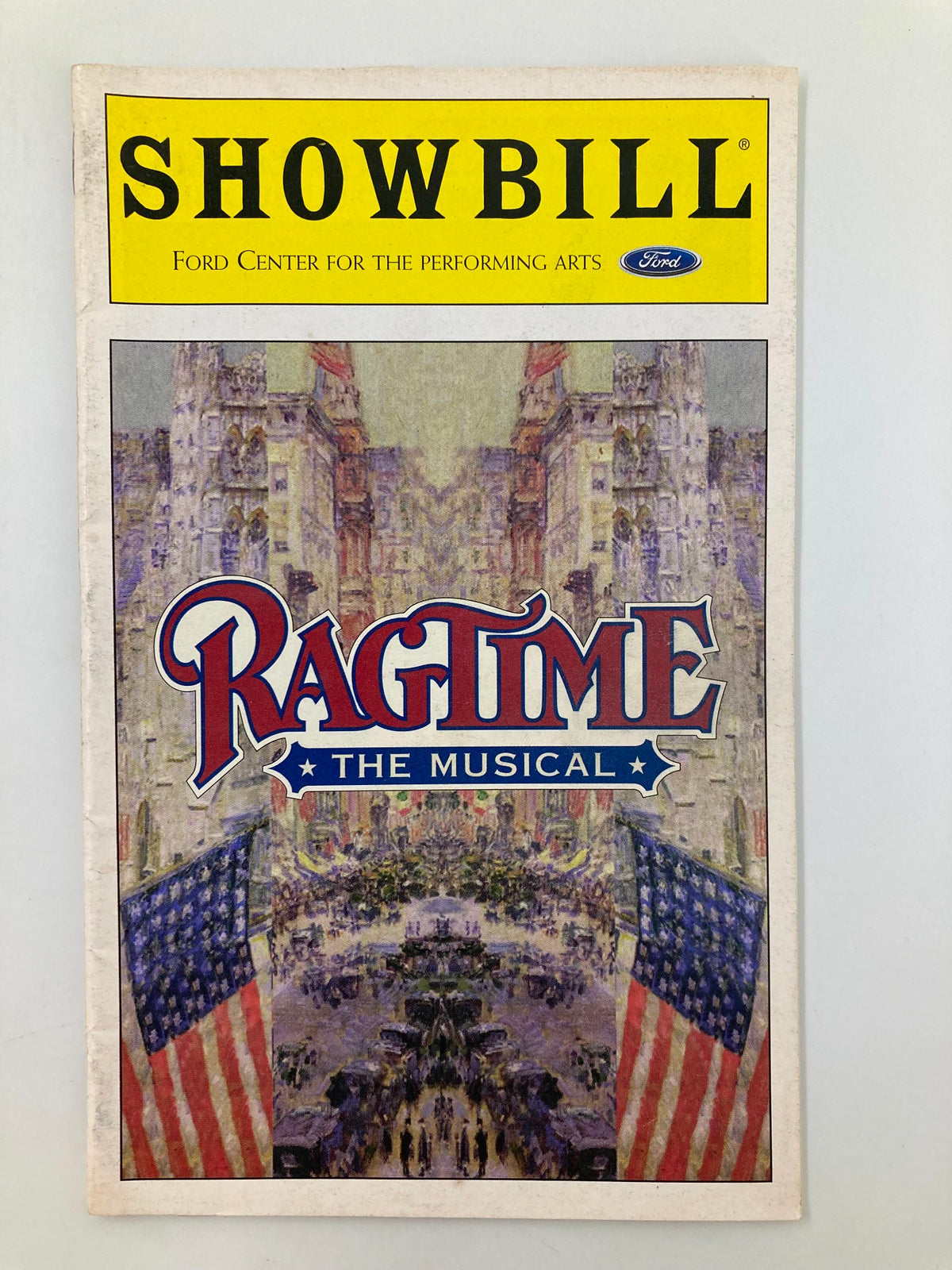 1998 Showbill for Ragtime at the Ford Center for the Performing Arts featuring Peter Friedman, showcasing vibrant cover artwork and American flag imagery.