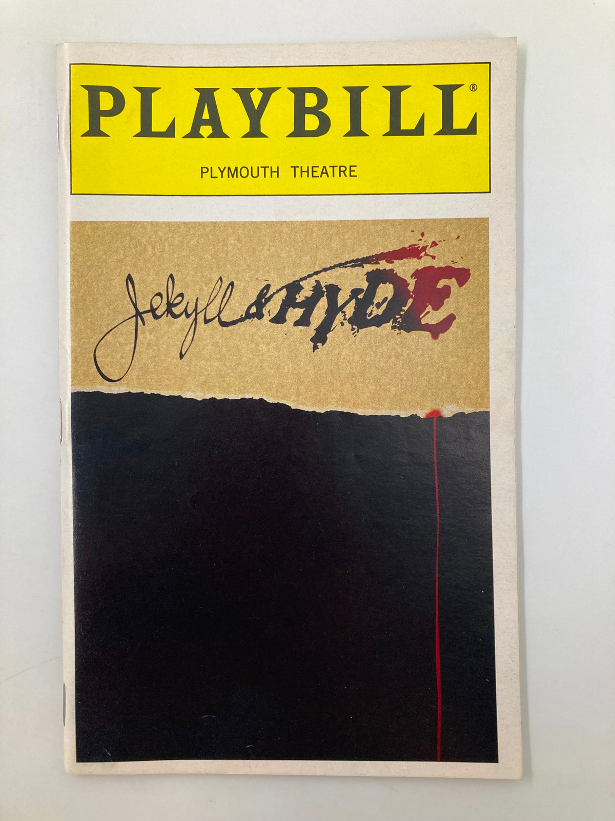1997 Playbill for Jekyll & Hyde at the Plymouth Theatre featuring the iconic logo and design.