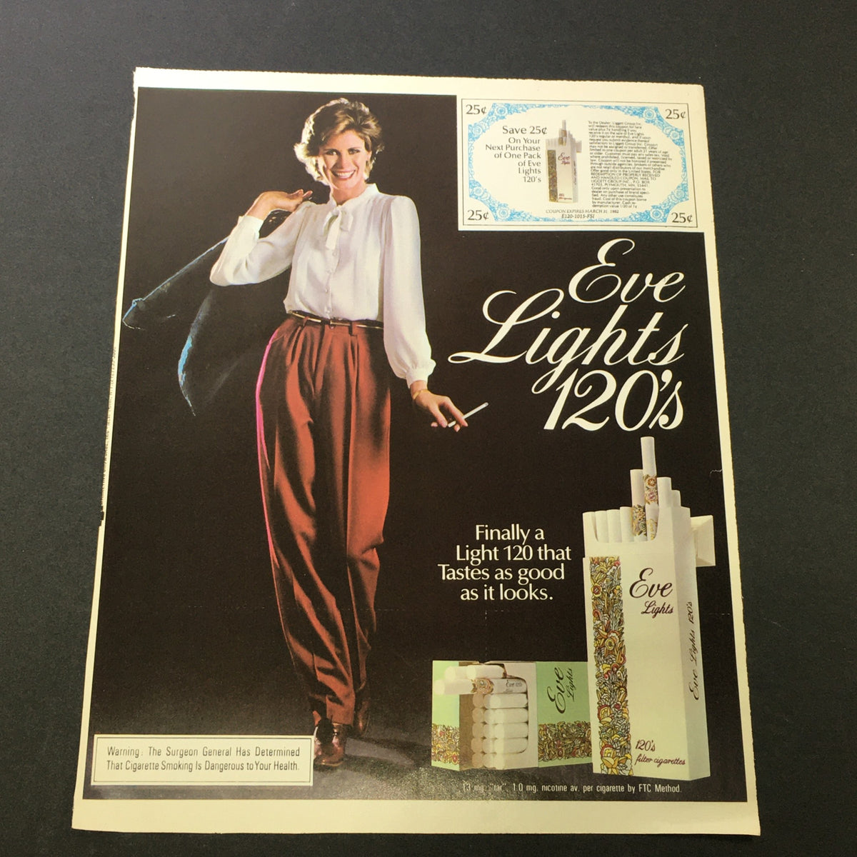 VTG Retro 1981 Eve Lights 120's Advertisement featuring a fashionable woman promoting Eve Lights 120's with an image of the product and a coupon for savings, showcasing vintage cigarette marketing.