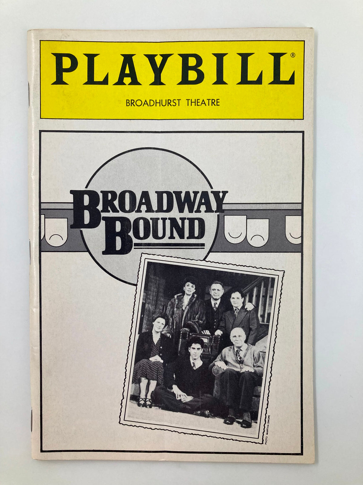 1986 Playbill for Broadway Bound at Broadhurst Theatre featuring a black and white photograph of the cast.