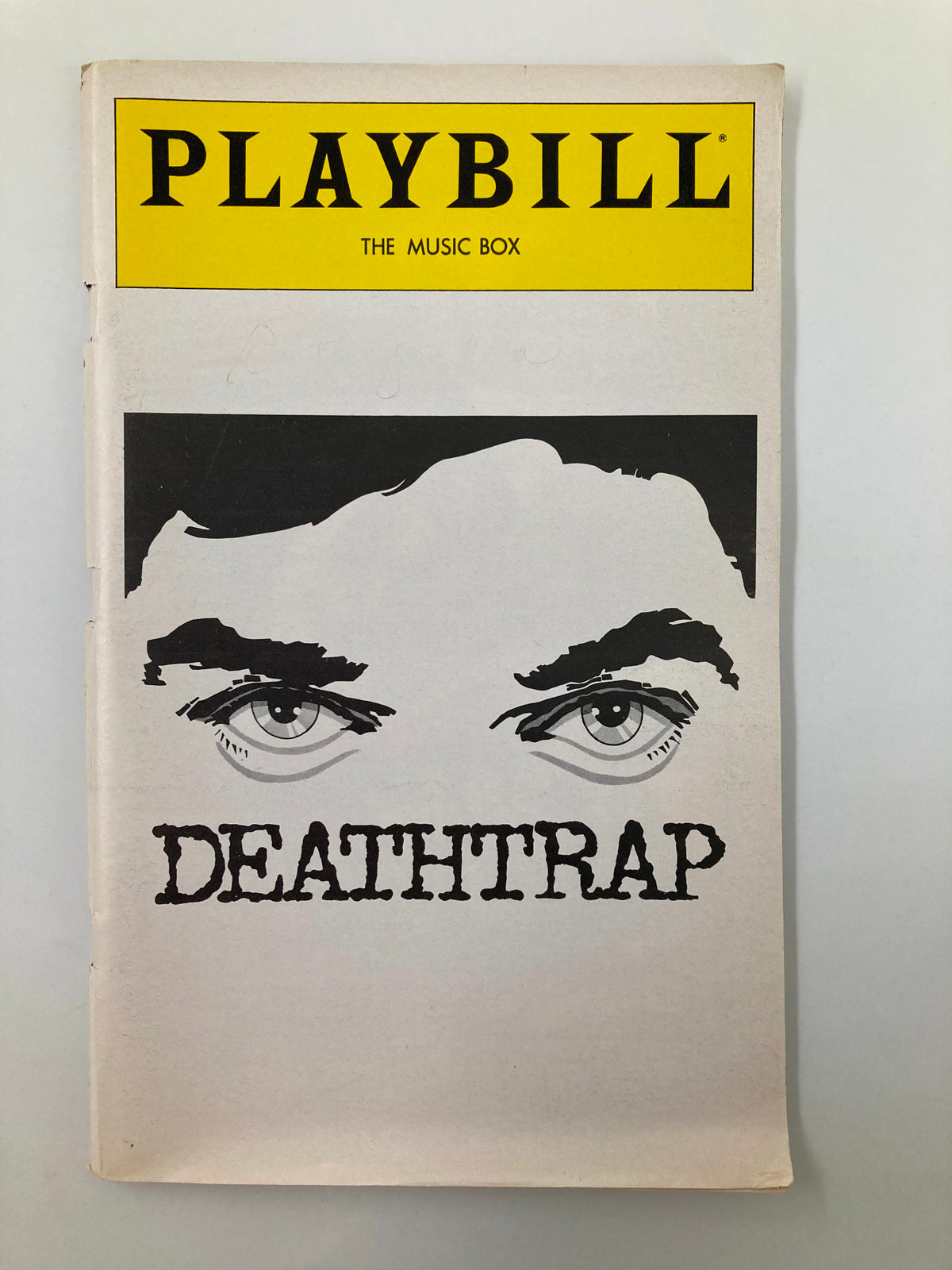 1979 Playbill for The Music Box production of Ira Levin's Death Trap featuring striking graphic design of eyes and the title 'DEATHTRAP'.