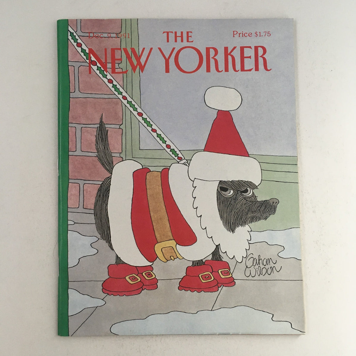 The New Yorker December 9 1991 full magazine cover by Gahan Wilson, featuring a humorous illustration of a dog dressed as Santa Claus in a winter setting.