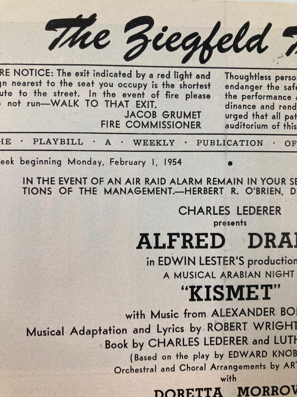 1954 Playbill The Ziegfeld Theatre Kismet emphasizing the title and credits on the cover, featuring iconic Broadway imagery and vintage typography.
