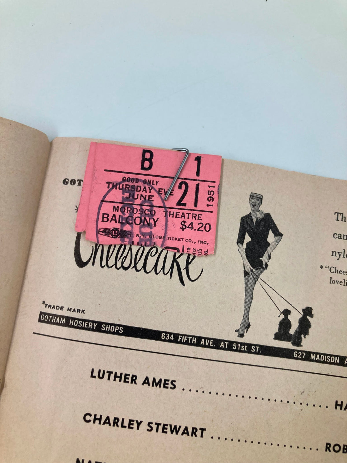 Close-up of a vintage 1951 Playbill ticket from the Morosco Theatre for the production of 'Gramercy Ghost', featuring details such as the date, location, and pricing.