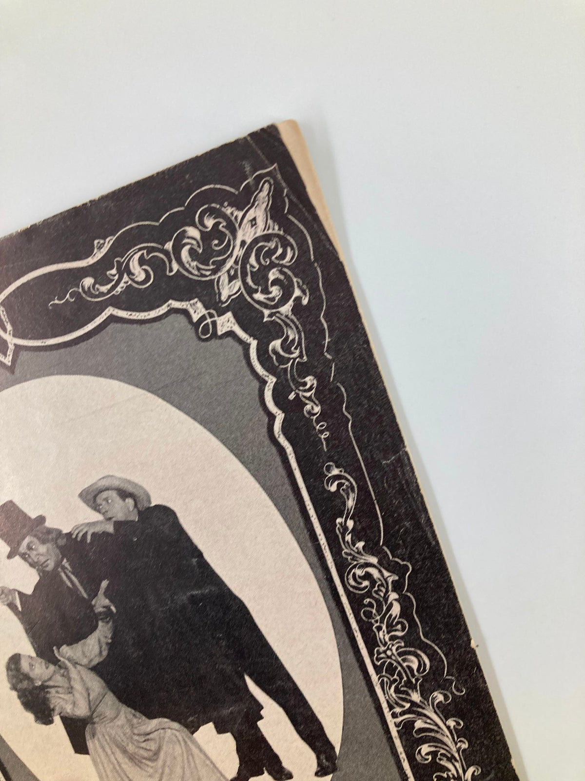 Close-up of the cover of the 1950 Theatre Mart magazine showcasing the intricate design and character details, featuring 'The Wayward Way' and 'The Drunkard' by Mildred Isle.