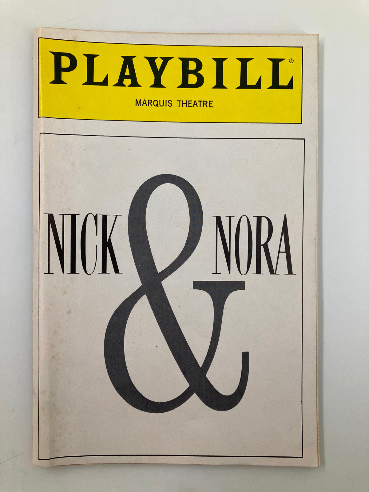 1991 Playbill for Nick & Nora at the Marquis Theatre featuring bold typography and iconic logo.