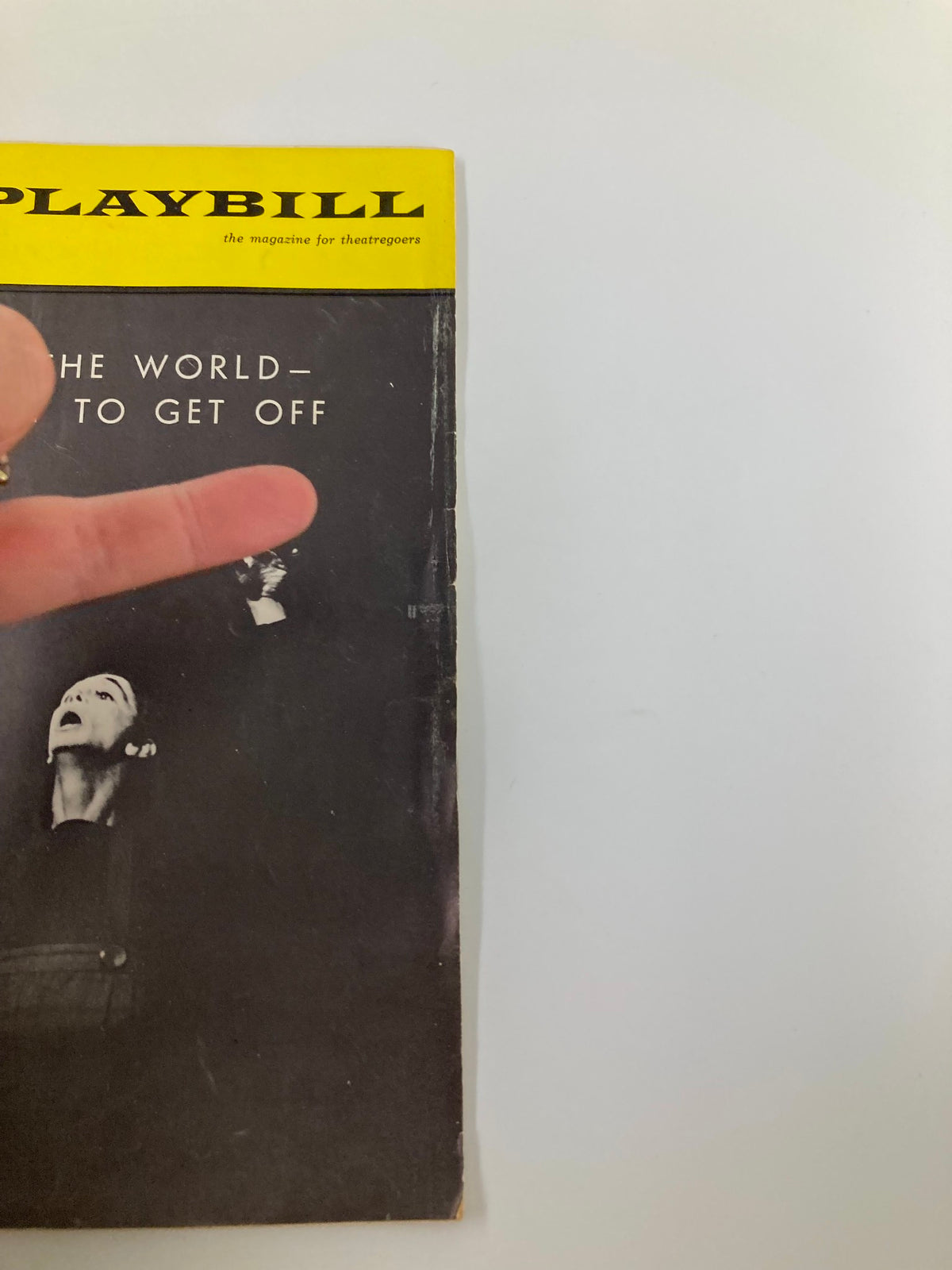 Close-up of the 1963 Playbill for 'Stop The World – I Want To Get Off' highlighting its unique cover.