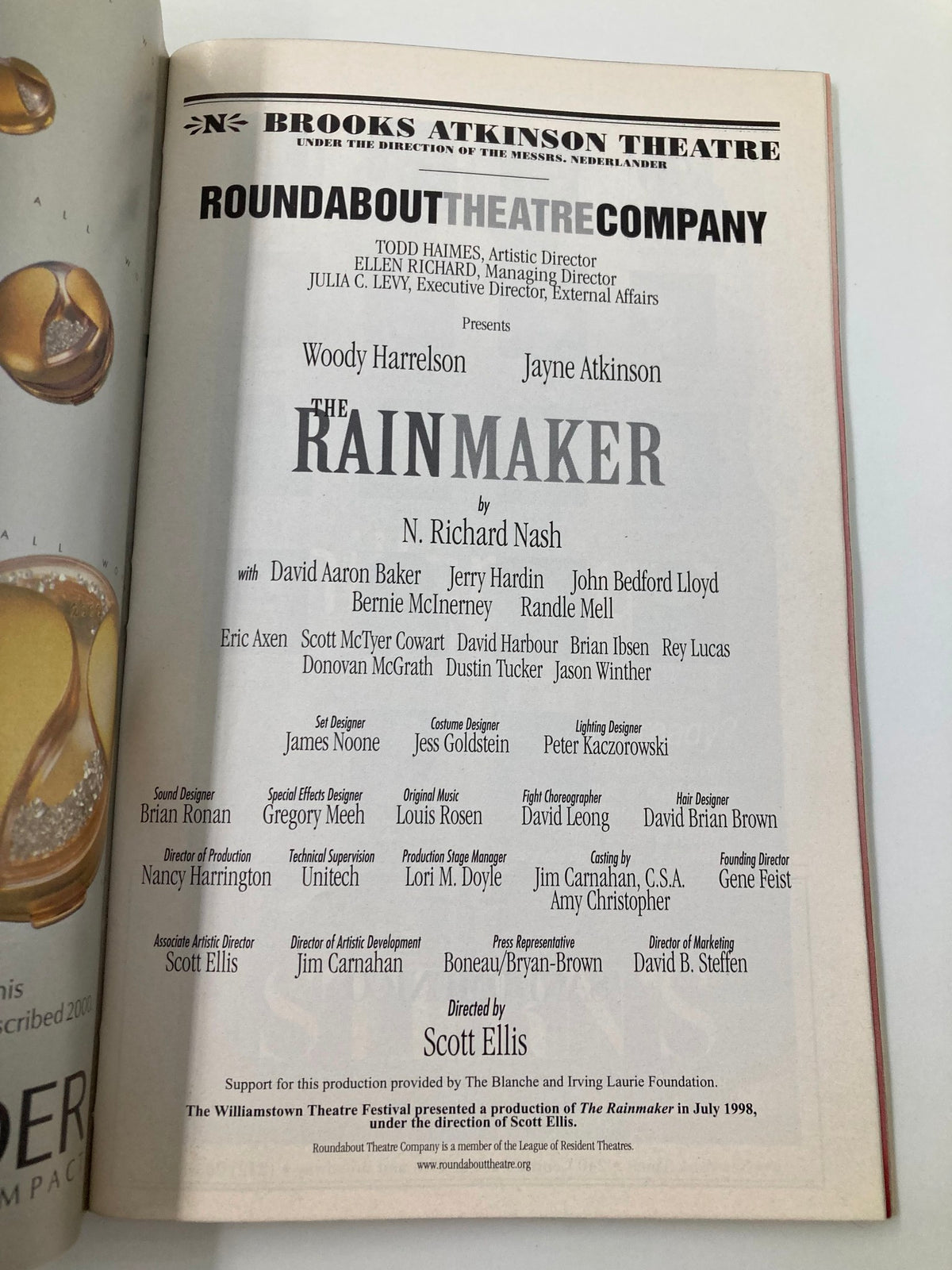 Cast page of the 1999 Playbill for The Rain Maker at Brooks Atkinson Theatre, detailing the performers' names and creative team behind the production.