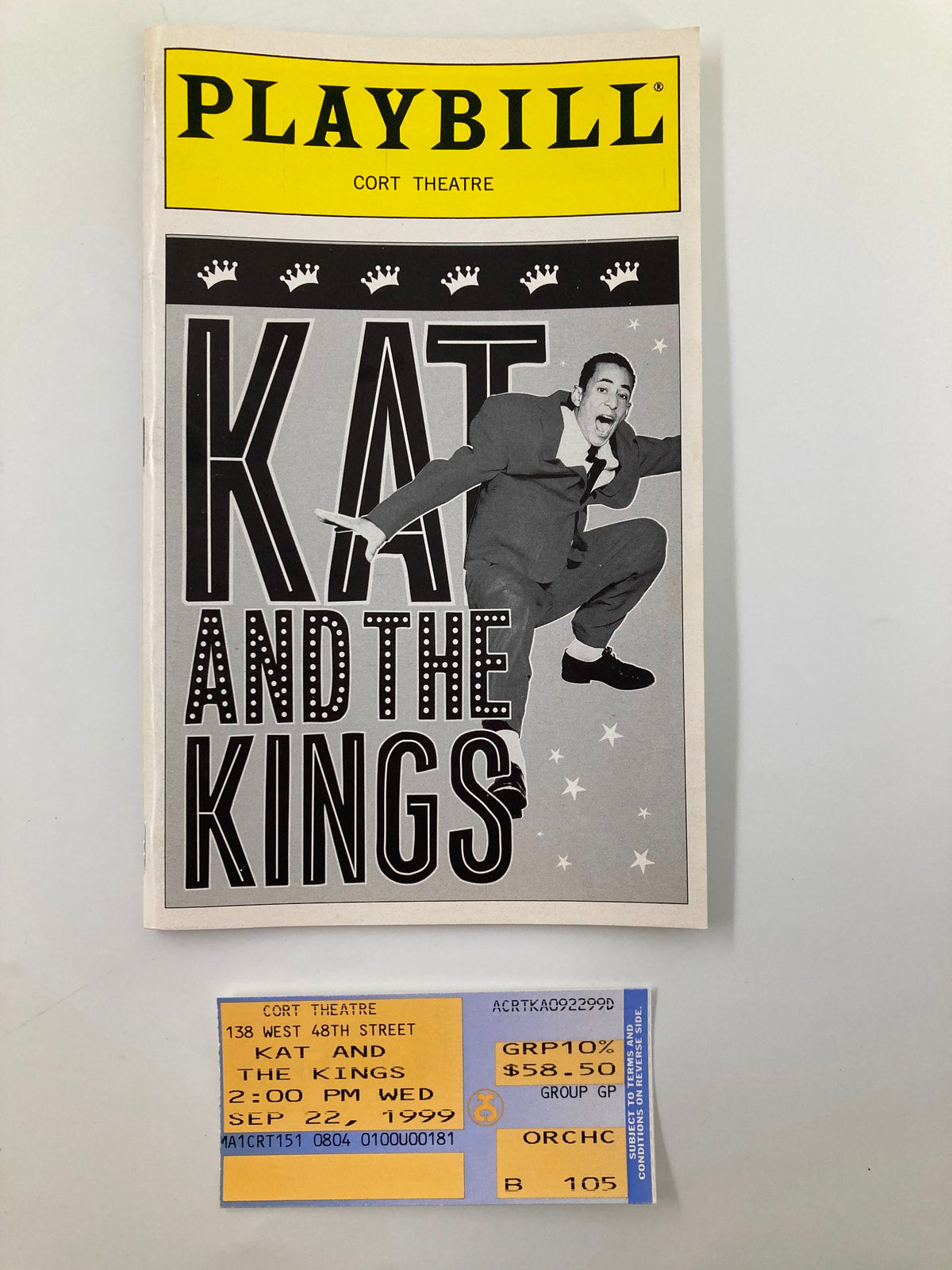1999 Playbill for Kat and The Kings at Cort Theatre featuring actor in vibrant performance pose alongside a ticket from the show.