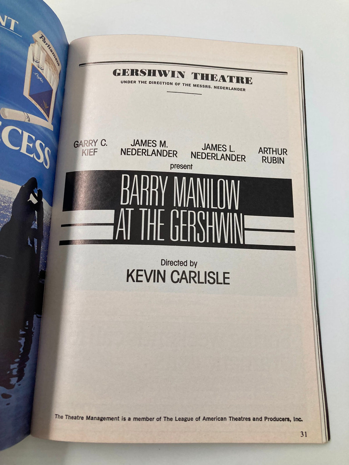 Page from the 1989 Playbill for Barry Manilow at The Gershwin Theatre, highlighting the production credits and director Kevin Carlisle.