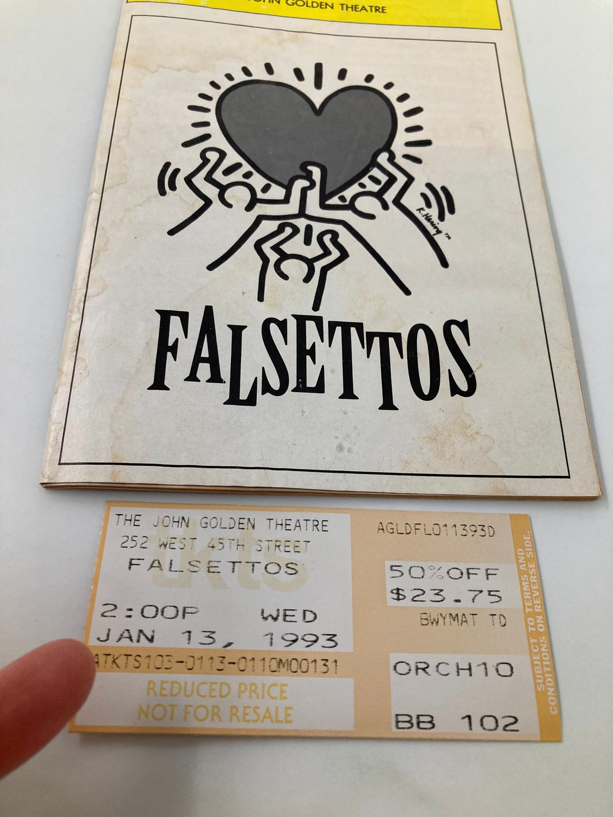 Image of the 1993 Playbill for Falsettos at the John Golden Theatre featuring artwork and a ticket stub dated January 13, 1993.