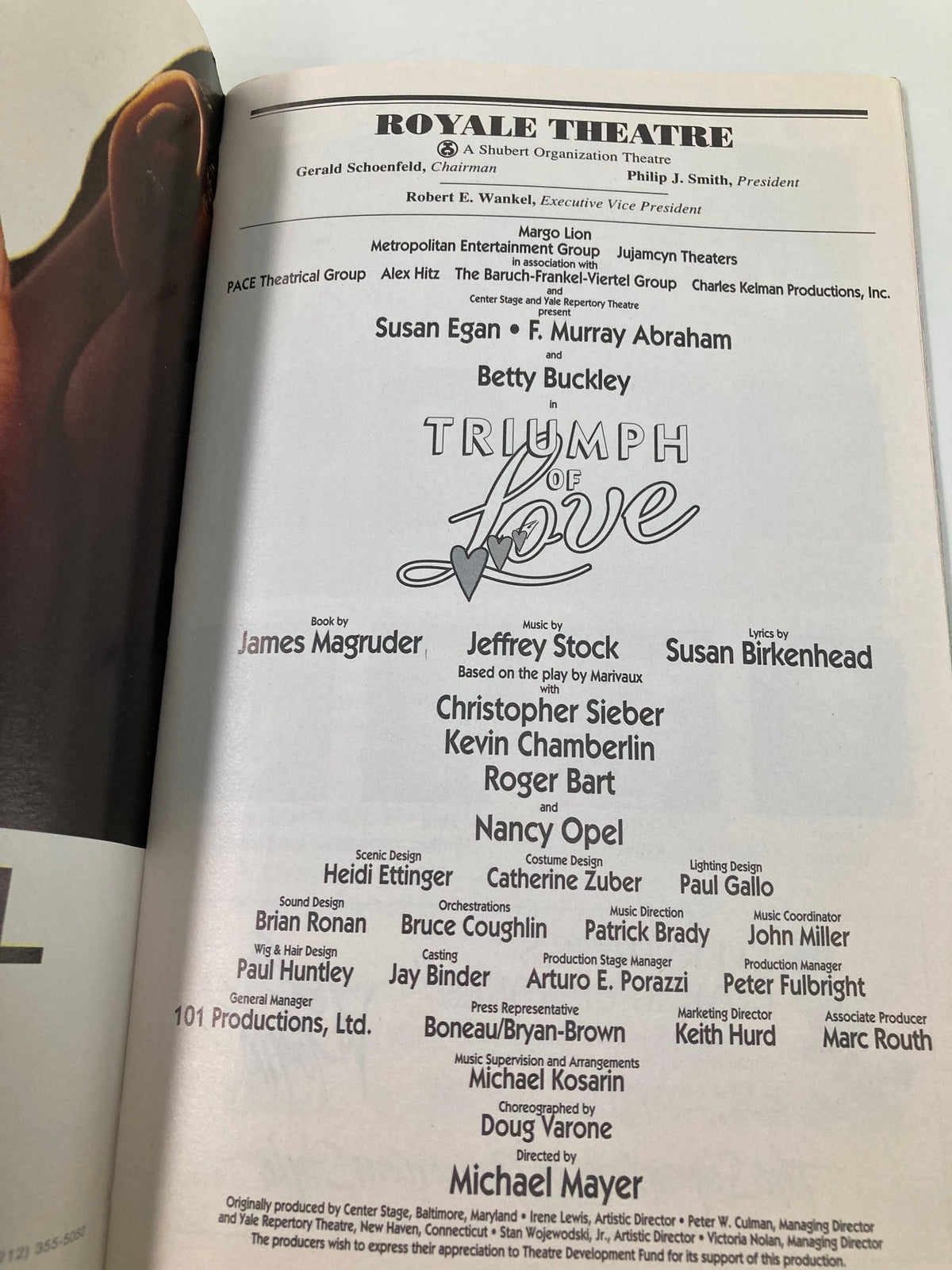 Credits page of the 1997 Playbill for 'Triumph of Love' at the Royale Theatre, showcasing cast and crew including Susan Egan and Betty Buckley.