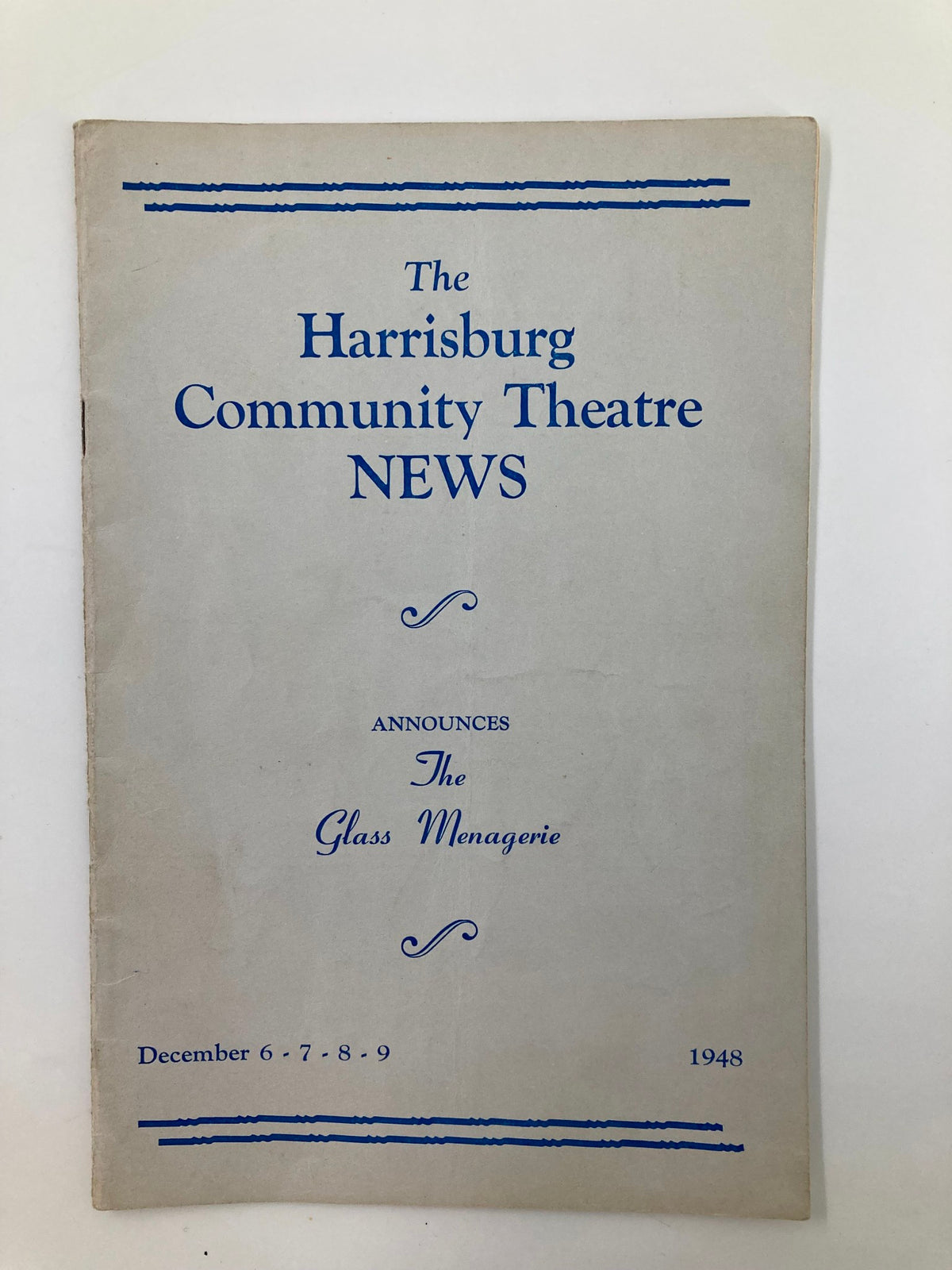 1948 The Harrisburg Community Theatre Playbill cover announcing 'The Glass Menagerie' production by Tennessee Williams, featuring event details including dates and theatre name.