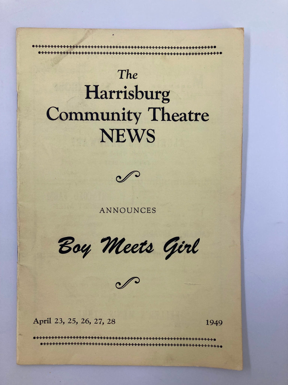 1949 Playbill for The Harrisburg Community Theatre production of Boy Meets Girl, featuring cover design and event details.