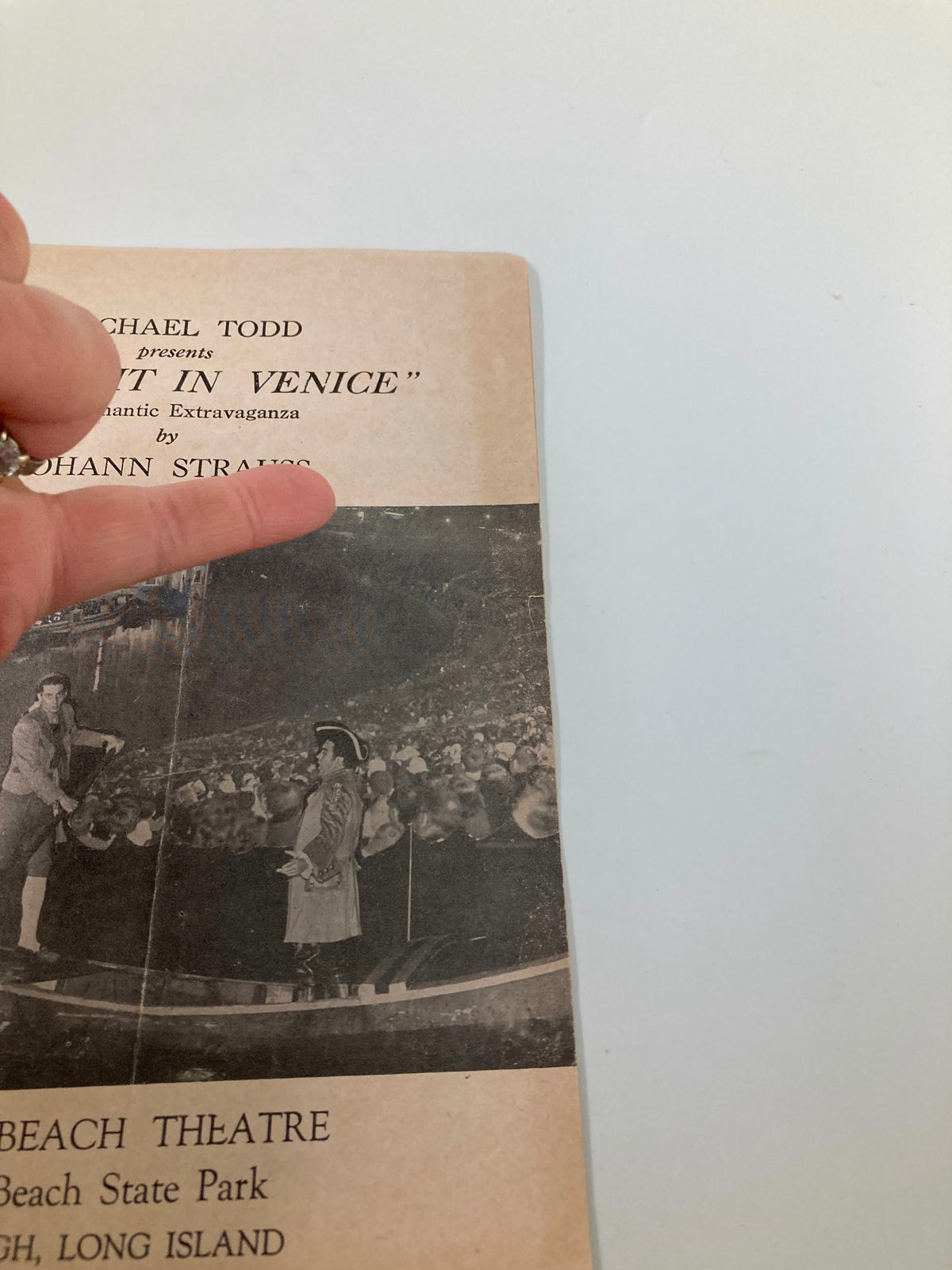 Close-up view of the 1929 Jones Beach Theatre Michael Todd A Night in Venice playbill, showcasing the performance details and image from the stage.