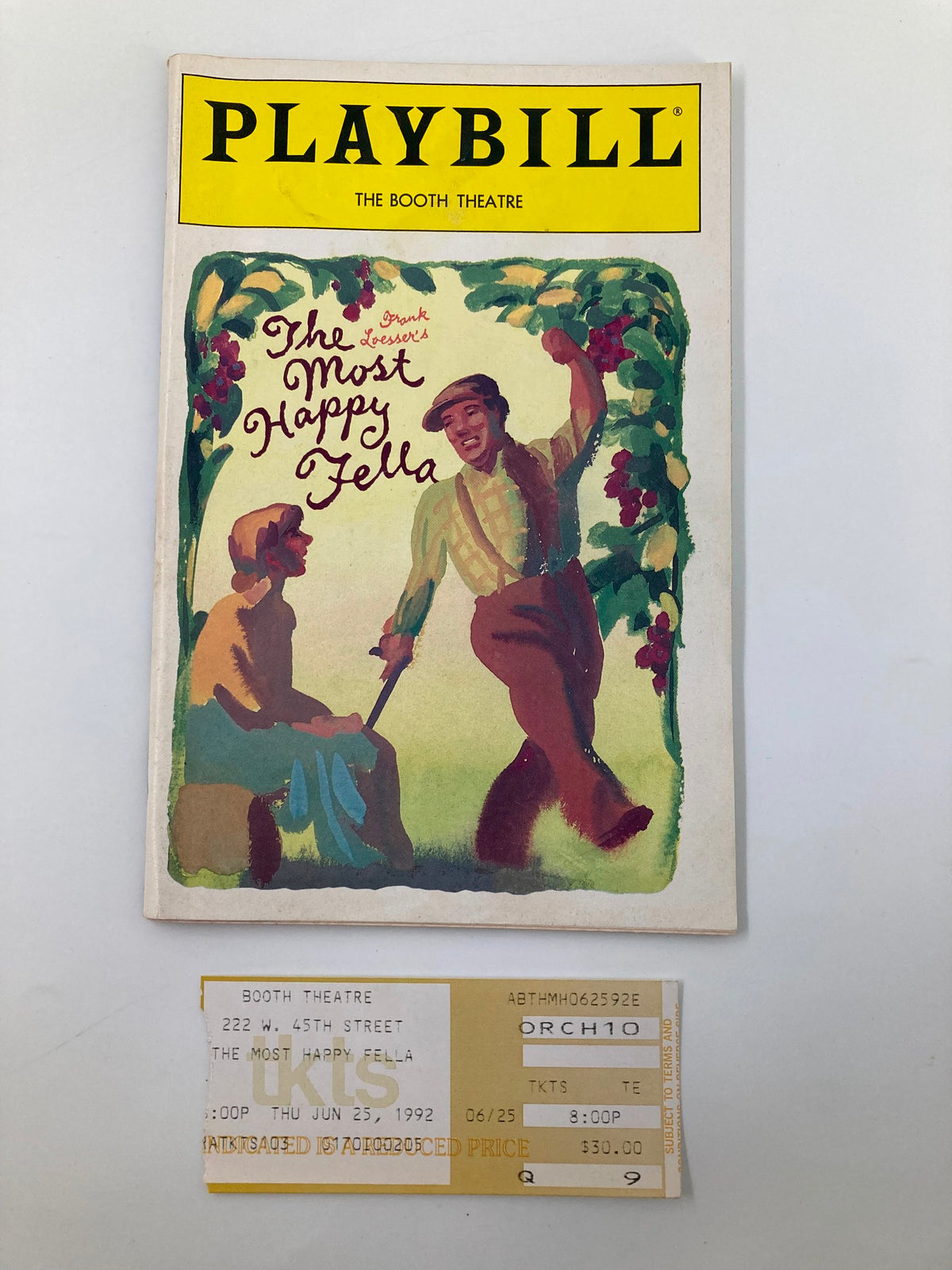 1992 Playbill for The Most Happy Fella at The Booth Theatre, featuring illustrations and the original ticket for the June 25, 1992 performance.