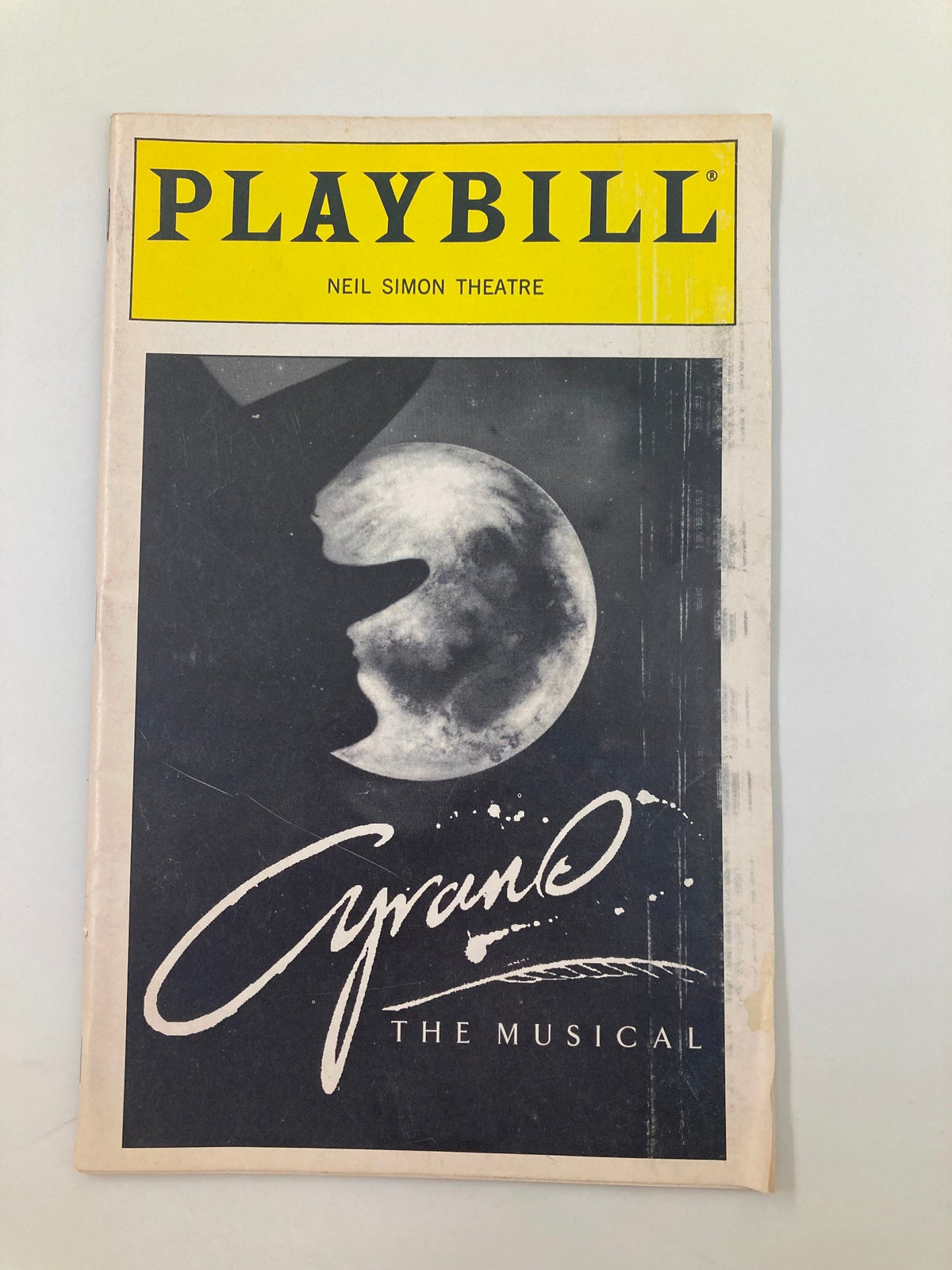 1994 Playbill for Cyrano the Musical at Neil Simon Theater showcasing the iconic cover design with moon imagery.