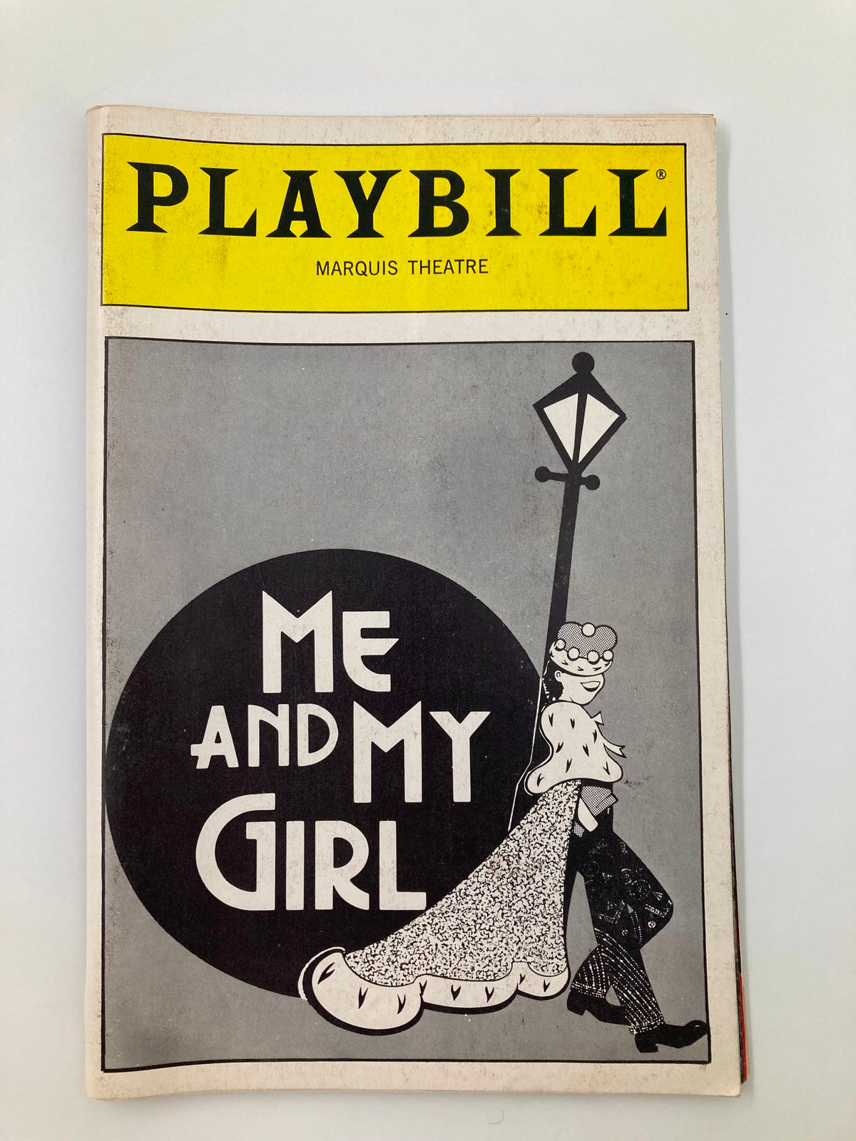 1987 Playbill for 'Me and My Girl' at the Marquis Theatre featuring a stylish cover illustration.